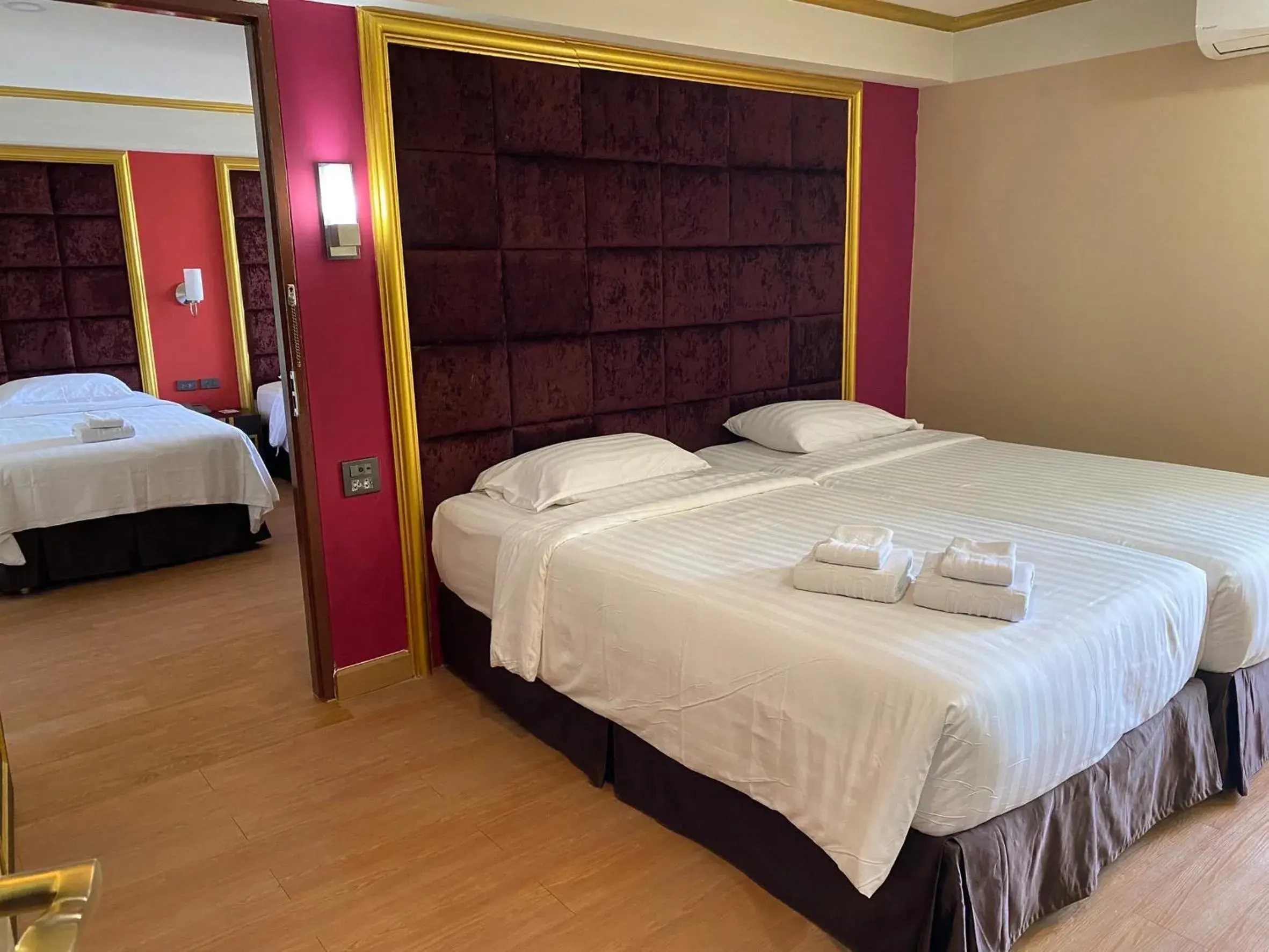 Bed in Grand Pink Hotel Hatyai Bed in Grand Pink Hotel Hatyai