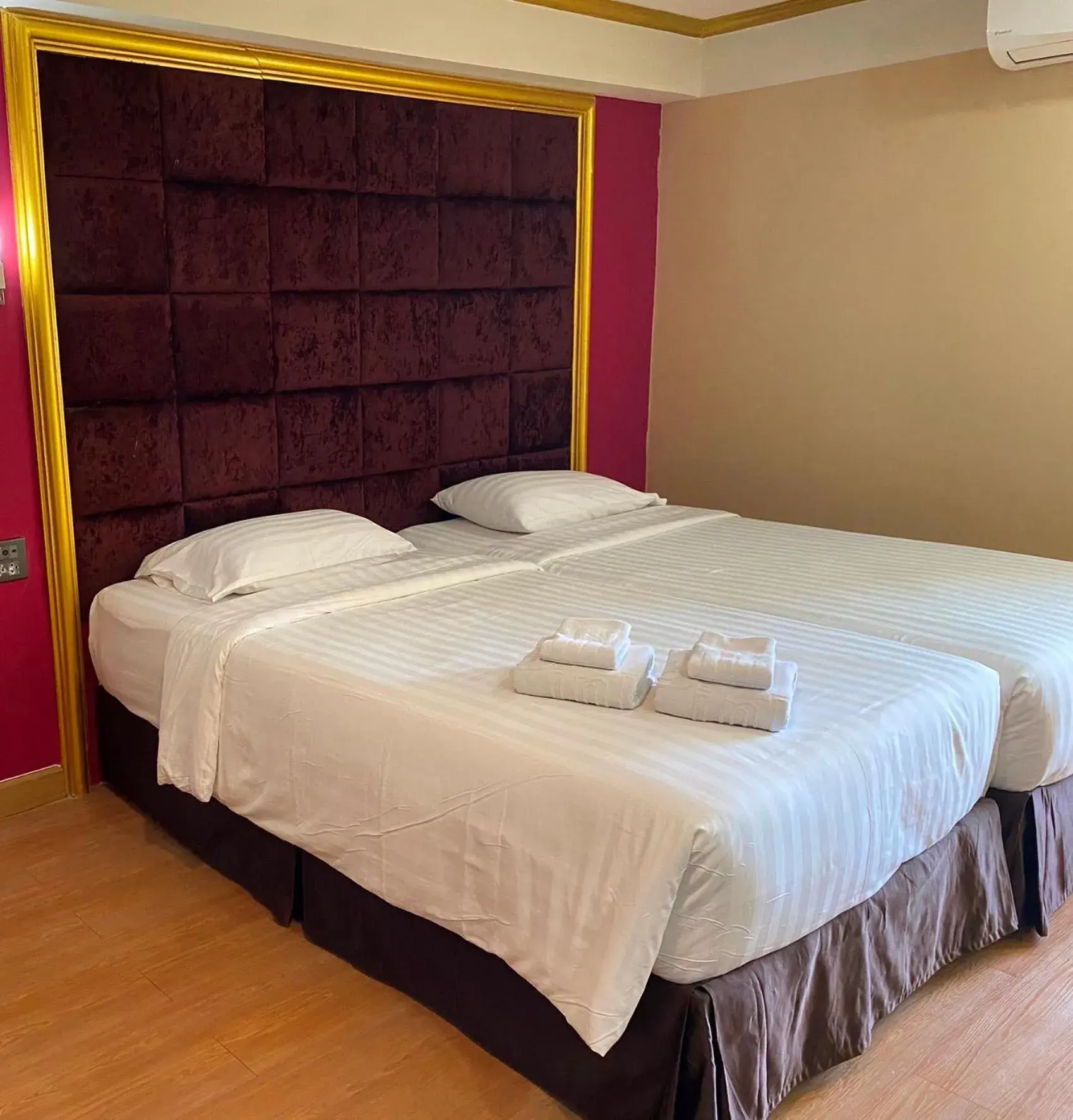 Bed in Grand Pink Hotel Hatyai Bed in Grand Pink Hotel Hatyai