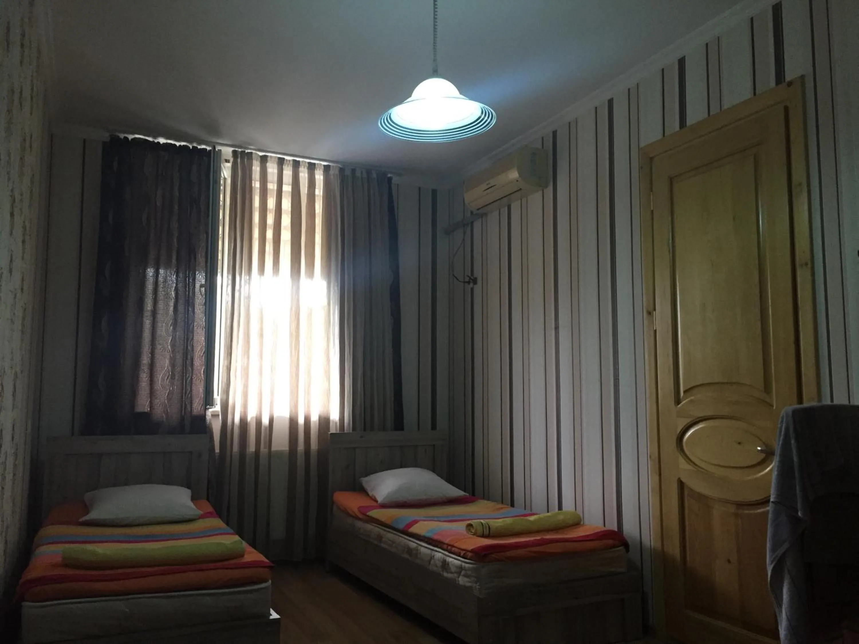 Family Room with Shared Bathroom in Guesthouse Gua