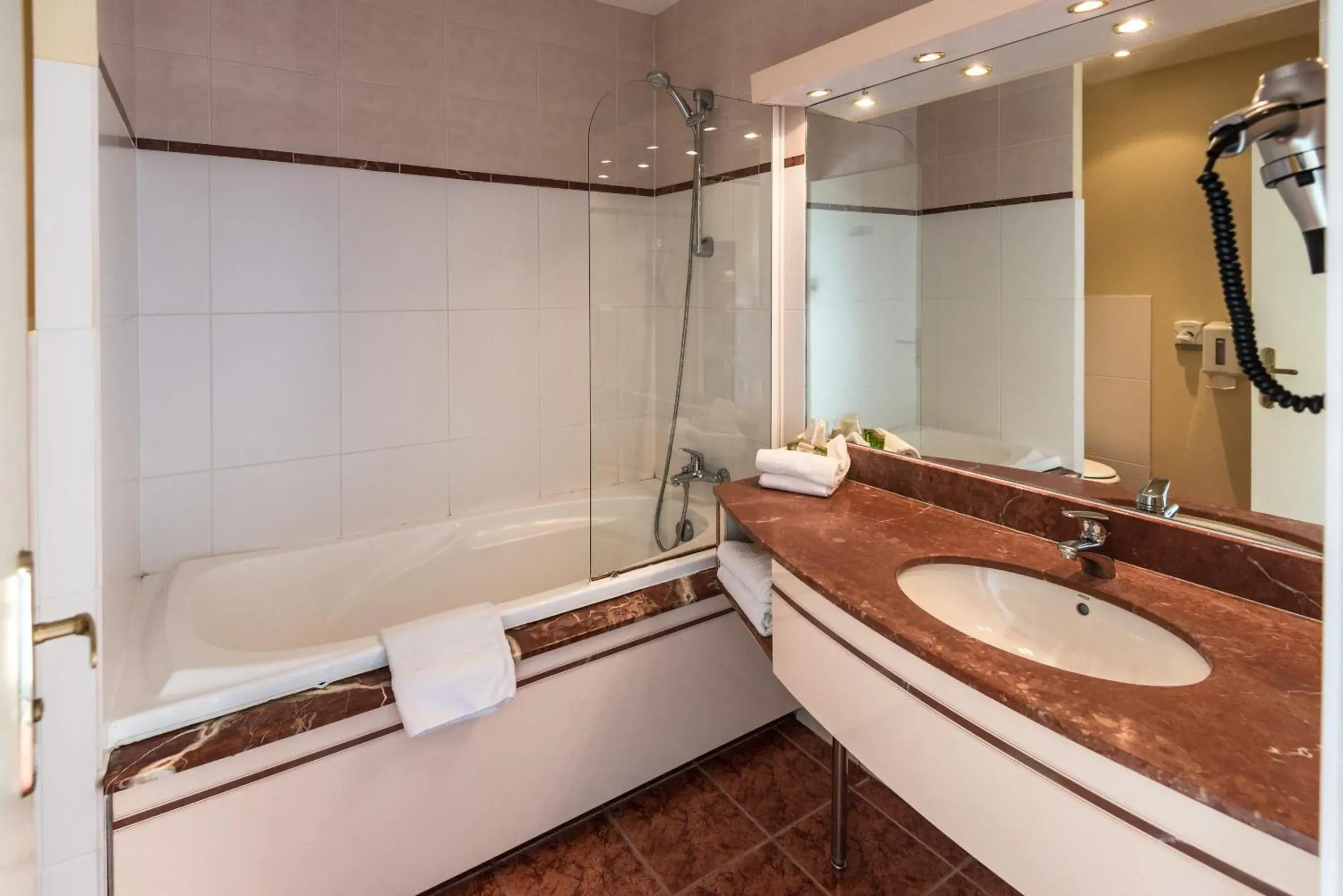 Bathroom in Logis L'Abreuvoir Bathroom in Logis L'Abreuvoir