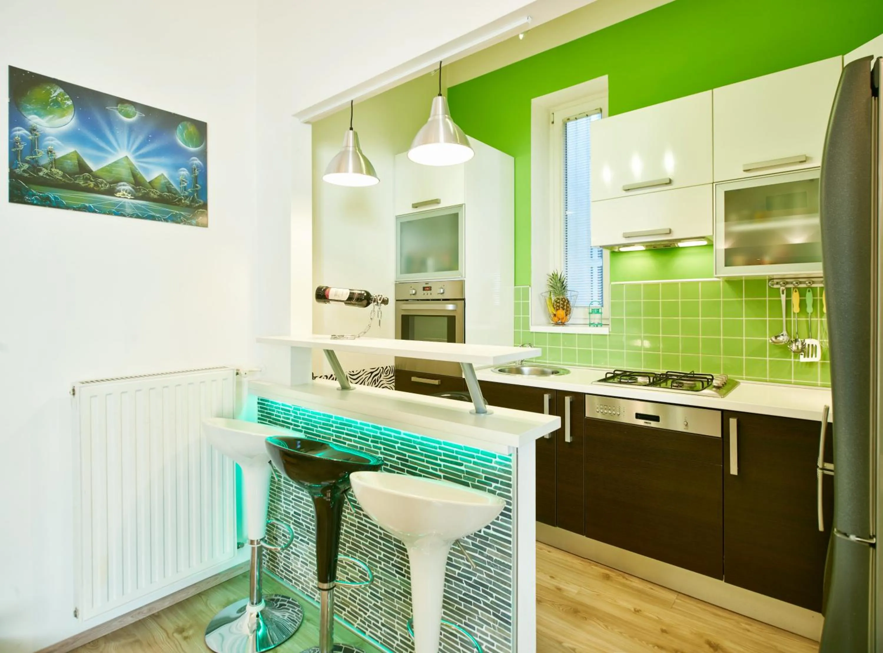 Kitchen or kitchenette in Studio Apartment Green Wall