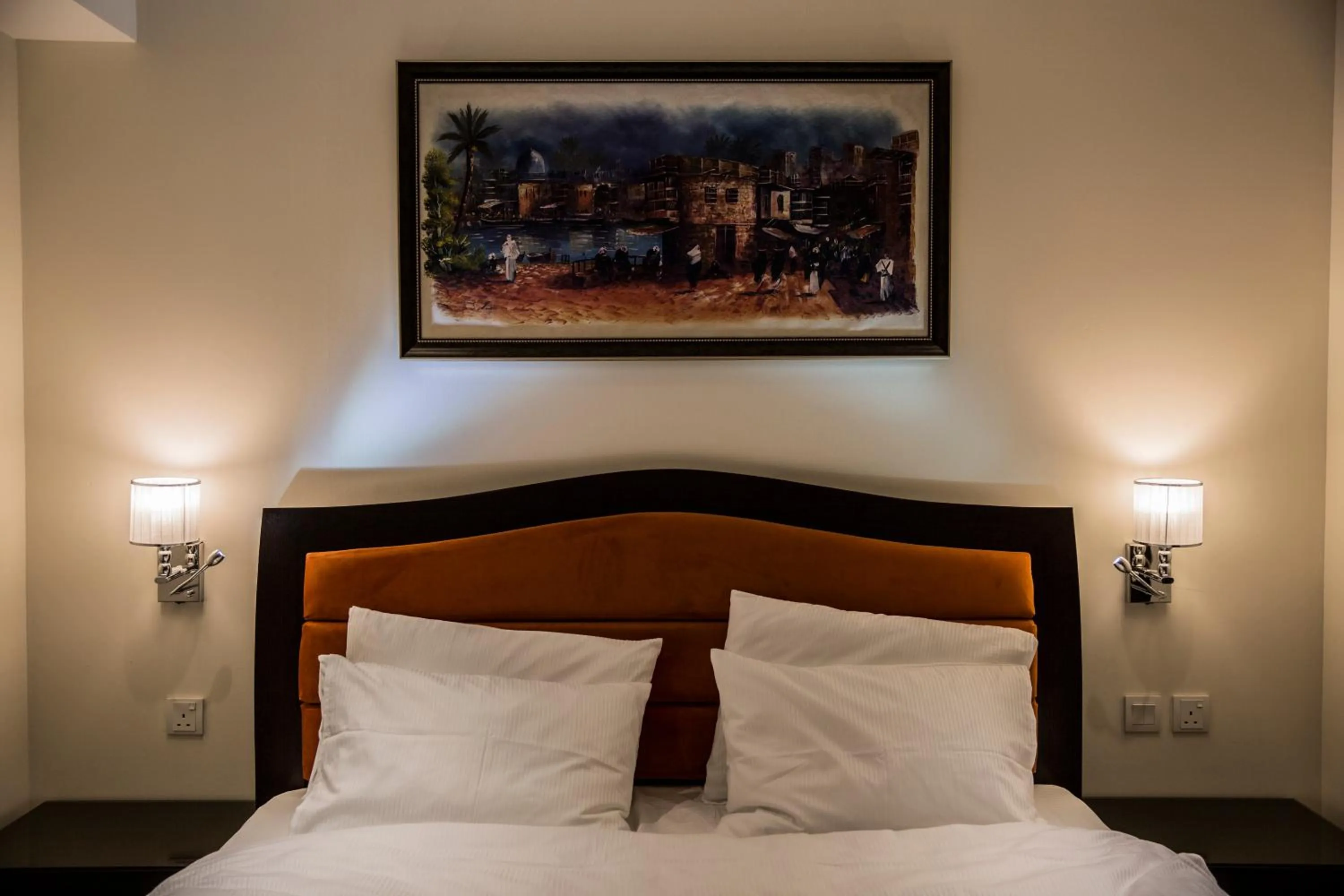 Bed in Naylover Hotel Suites