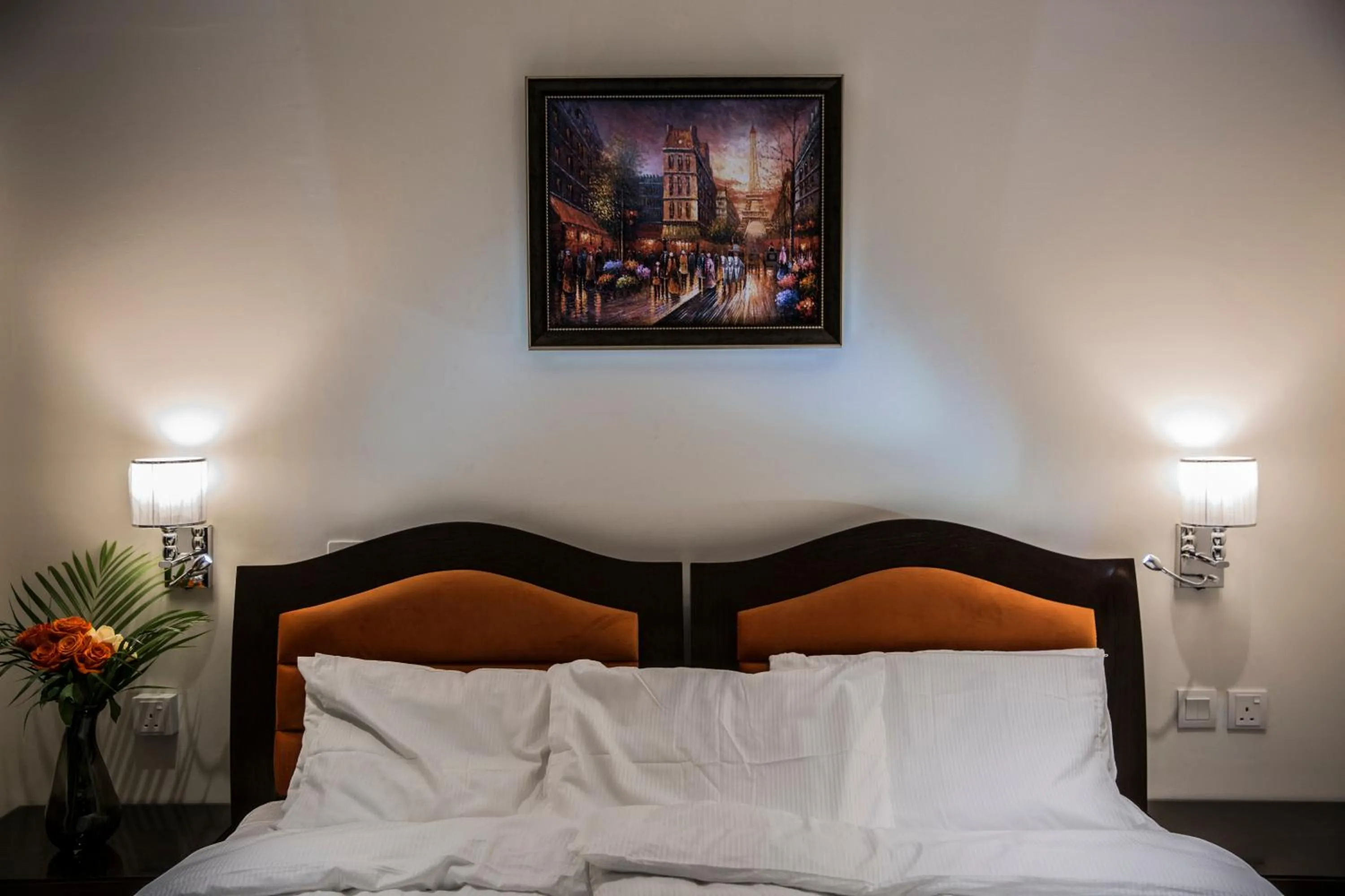 Bed in Naylover Hotel Suites