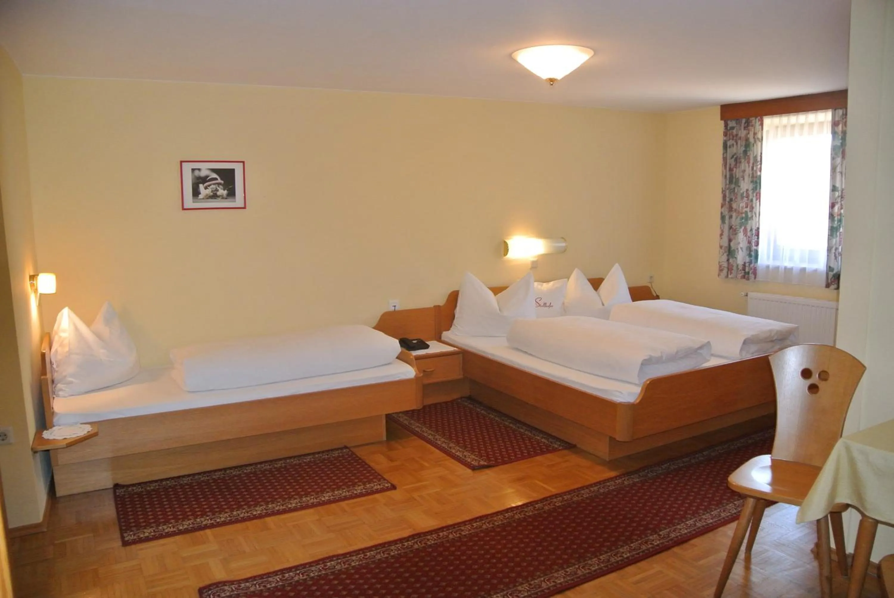 Photo of the whole room, Bed in Gasthof Zum Stollhofer