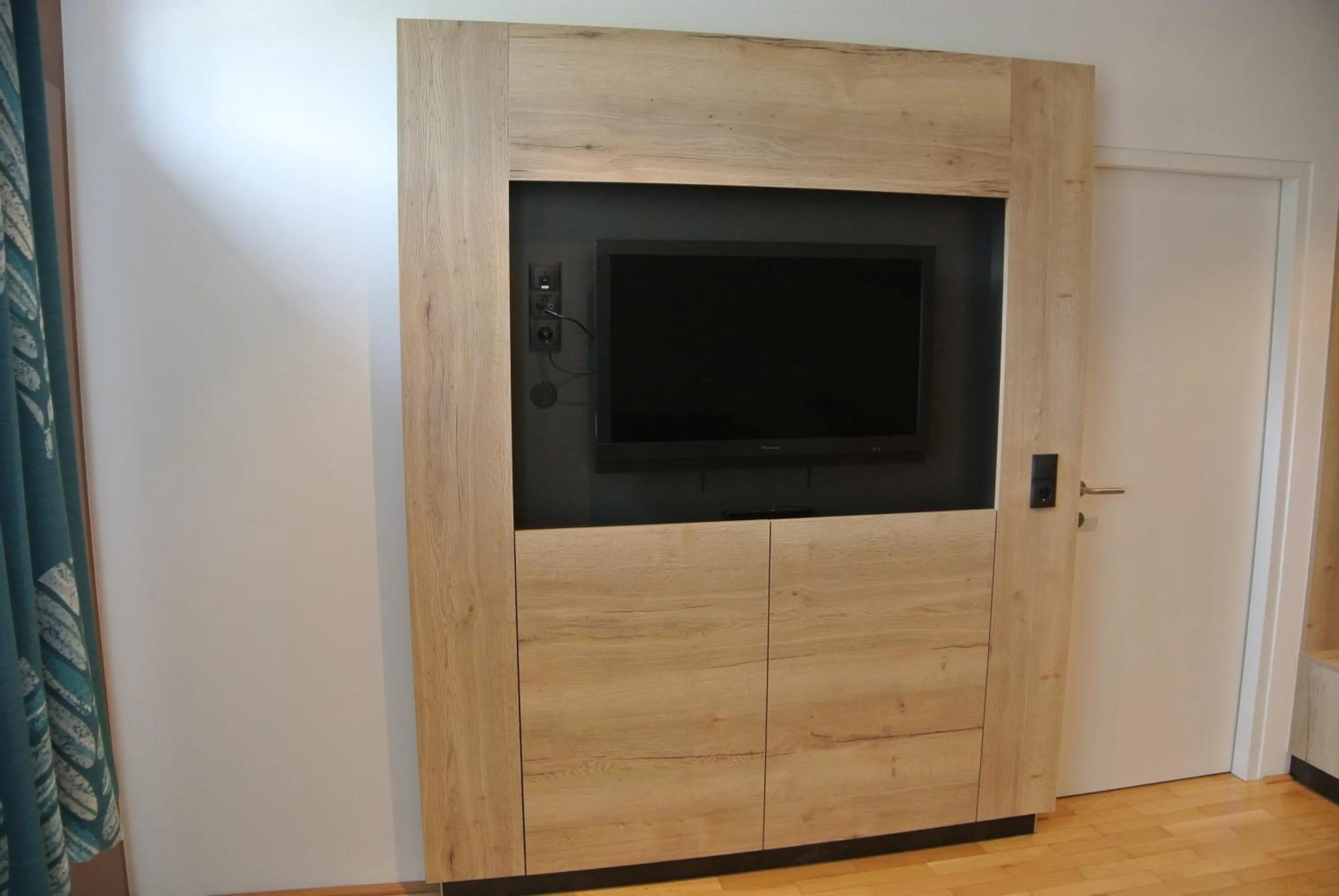 Communal lounge/ TV room in Gasthof Zum Stollhofer