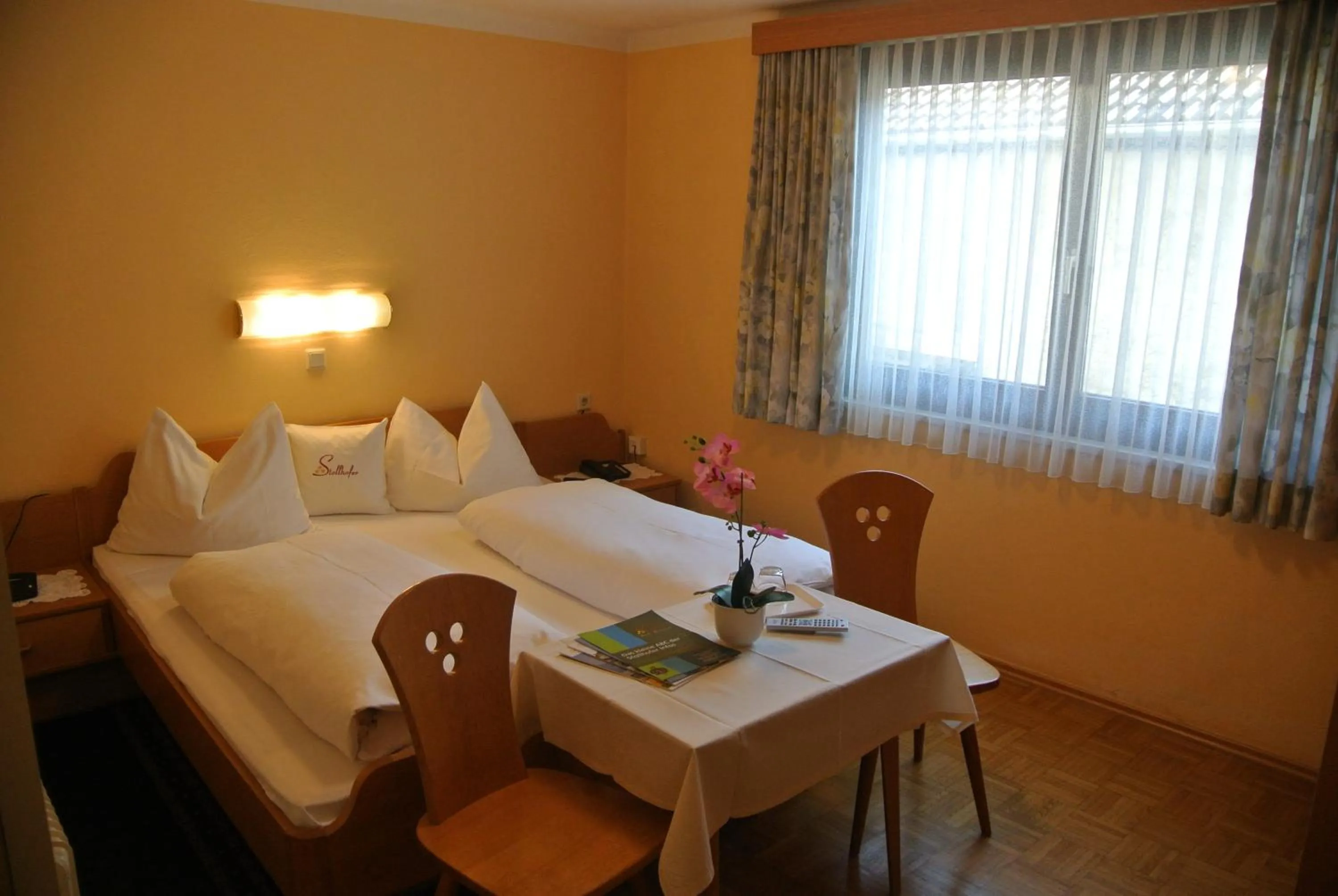 Photo of the whole room, Bed in Gasthof Zum Stollhofer