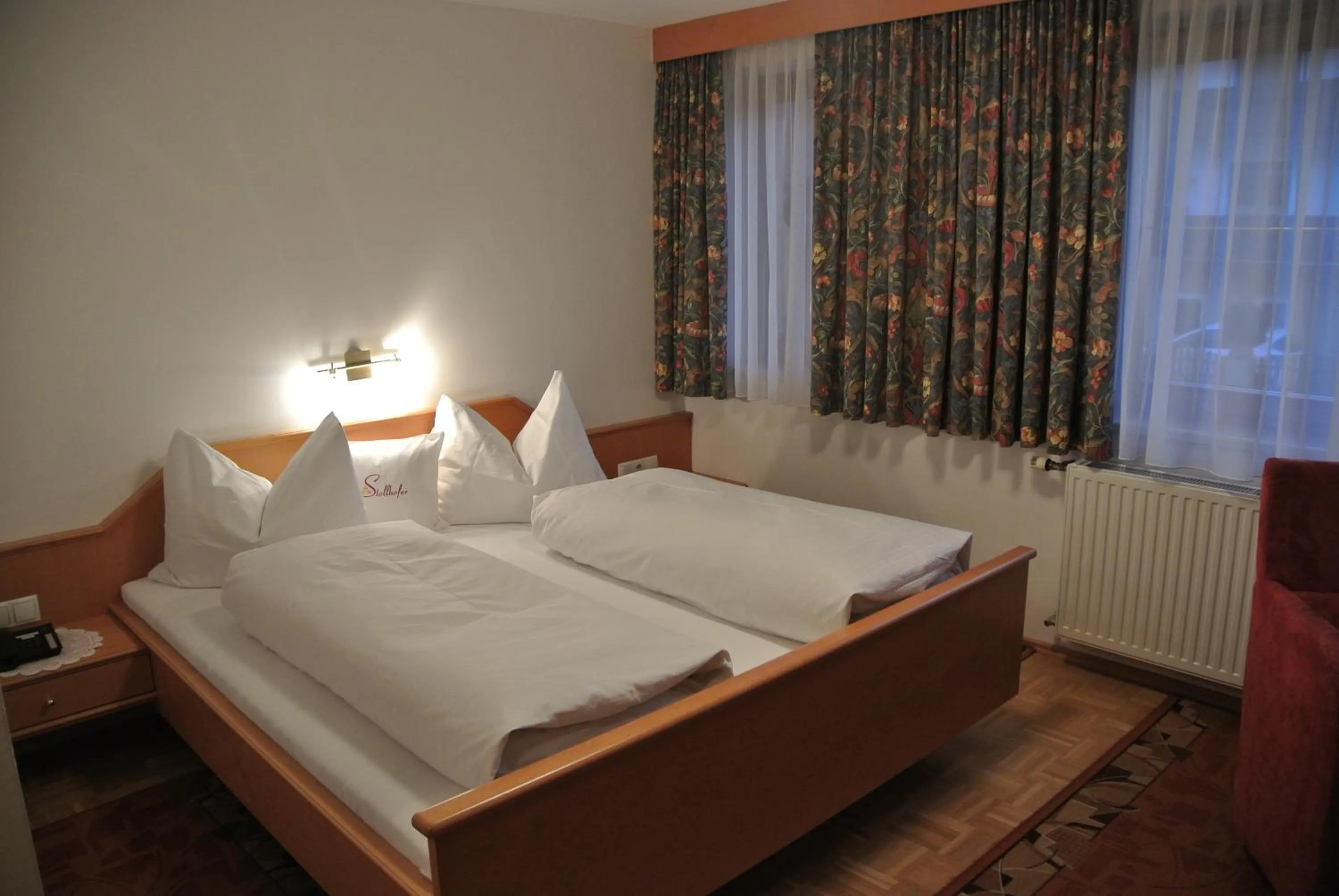 Photo of the whole room, Bed in Gasthof Zum Stollhofer