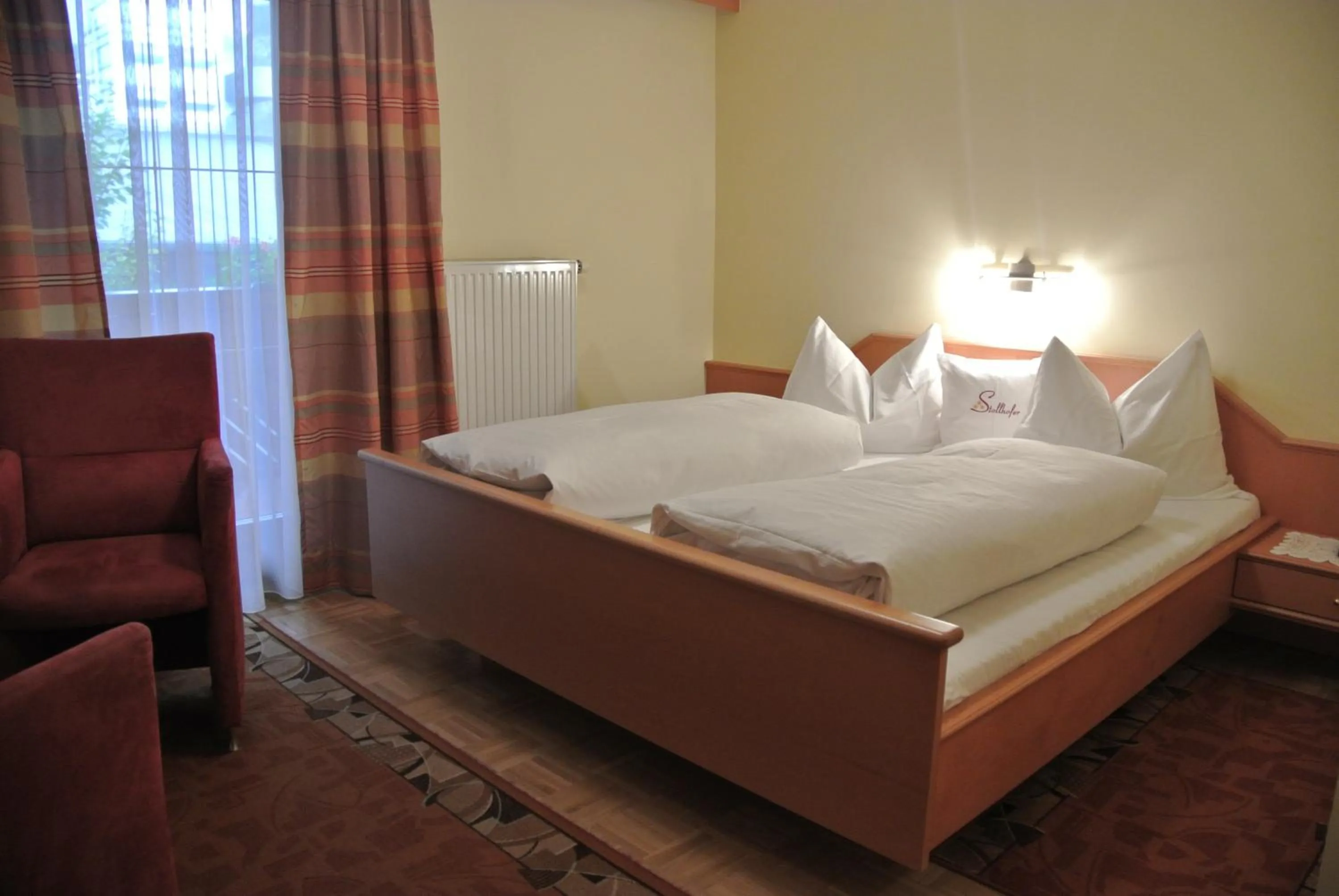 Photo of the whole room, Bed in Gasthof Zum Stollhofer