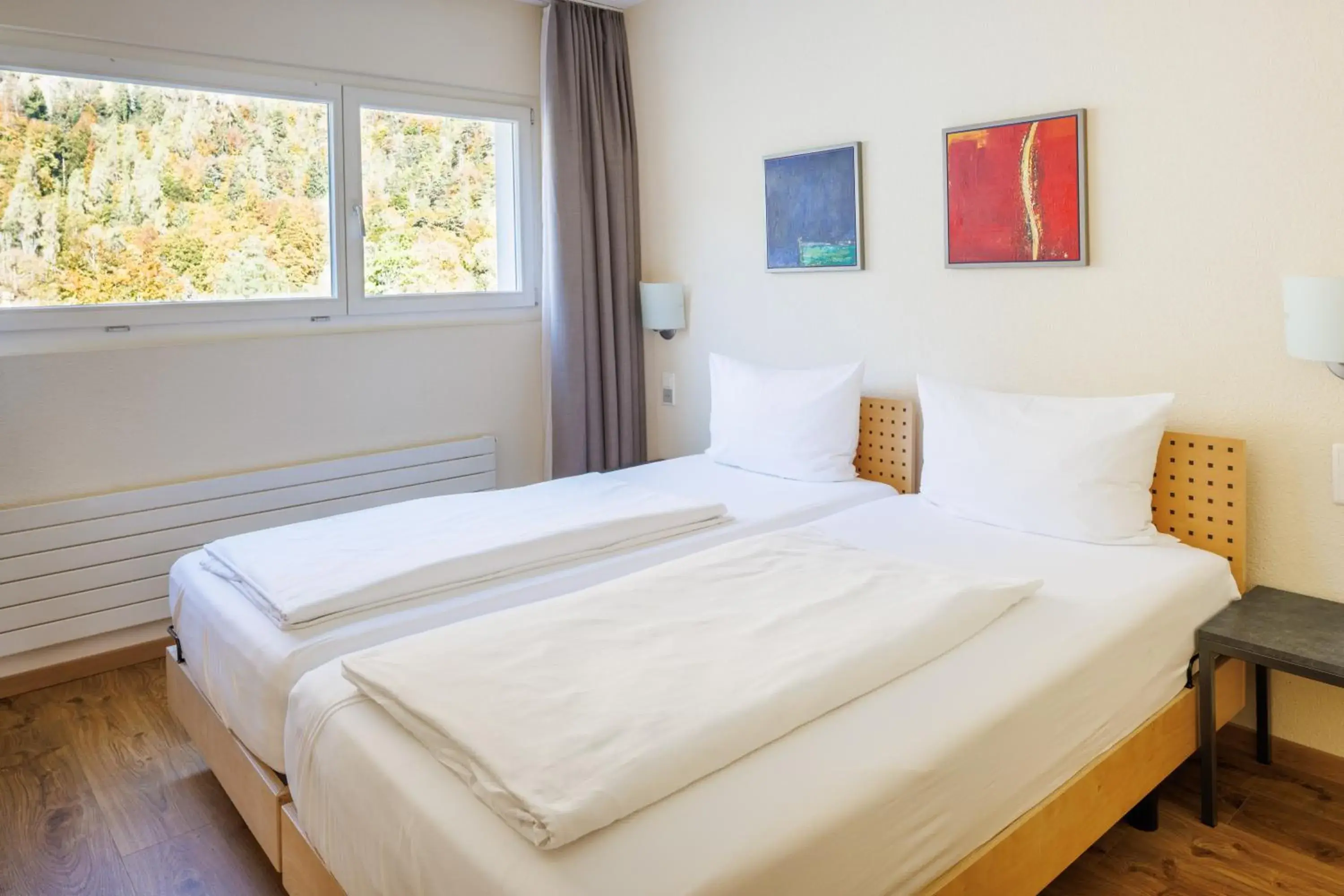 Bedroom, Bed in Hapimag Ferienwohnungen Interlaken Bedroom, Bed in Hapimag Ferienwohnungen Interlaken