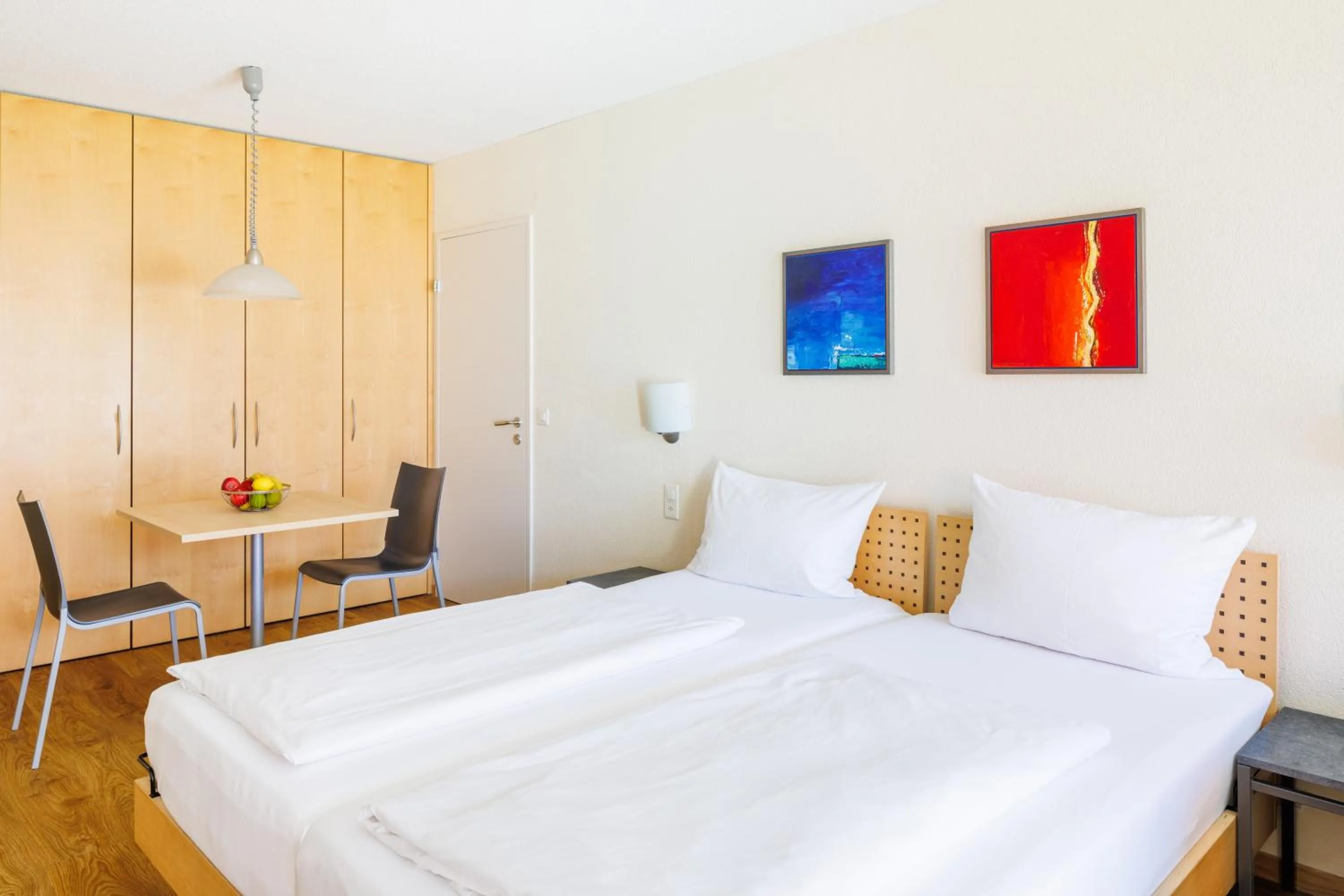 Bedroom, Bed in Hapimag Ferienwohnungen Interlaken