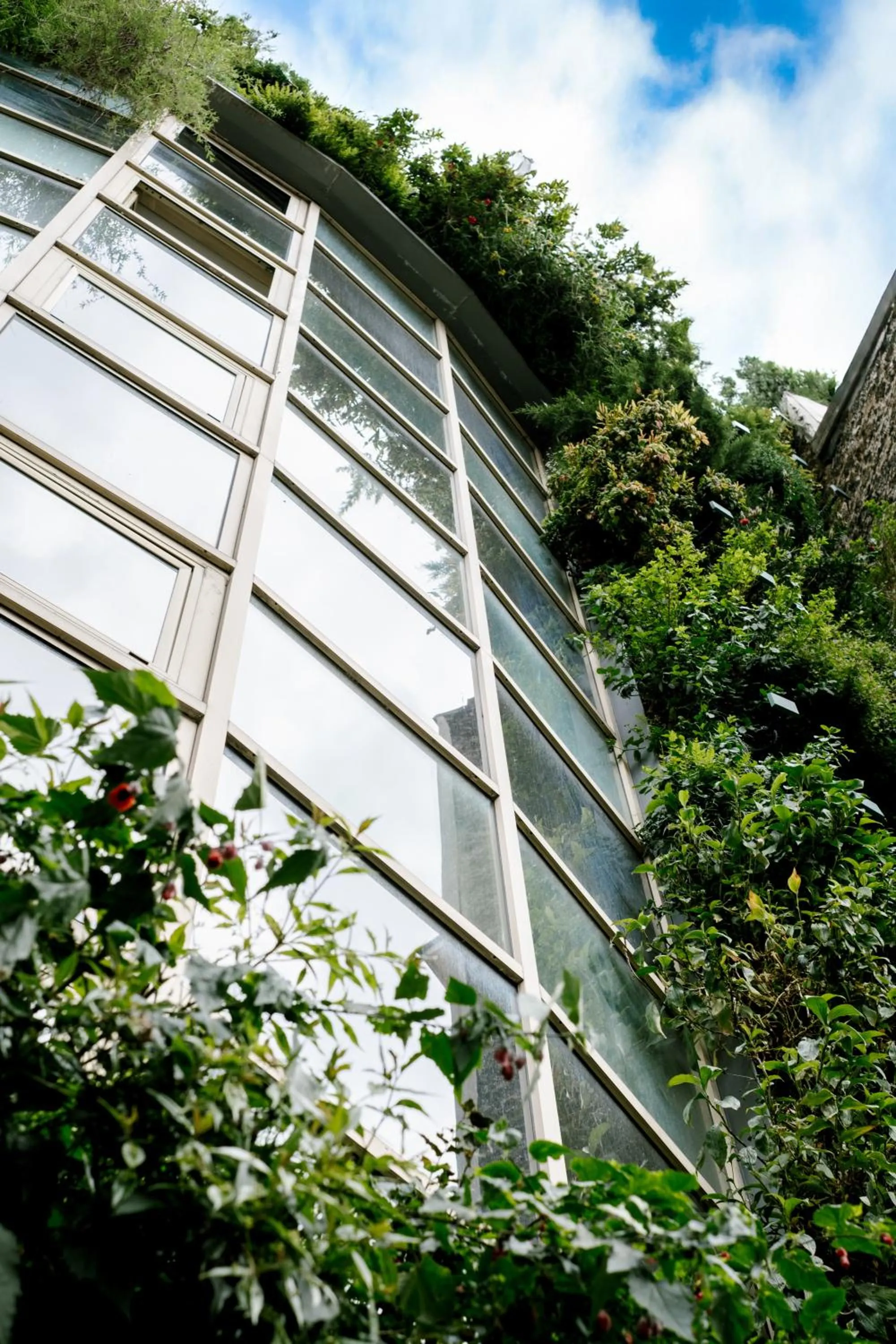 Property building in Green hotels Confort Paris 13