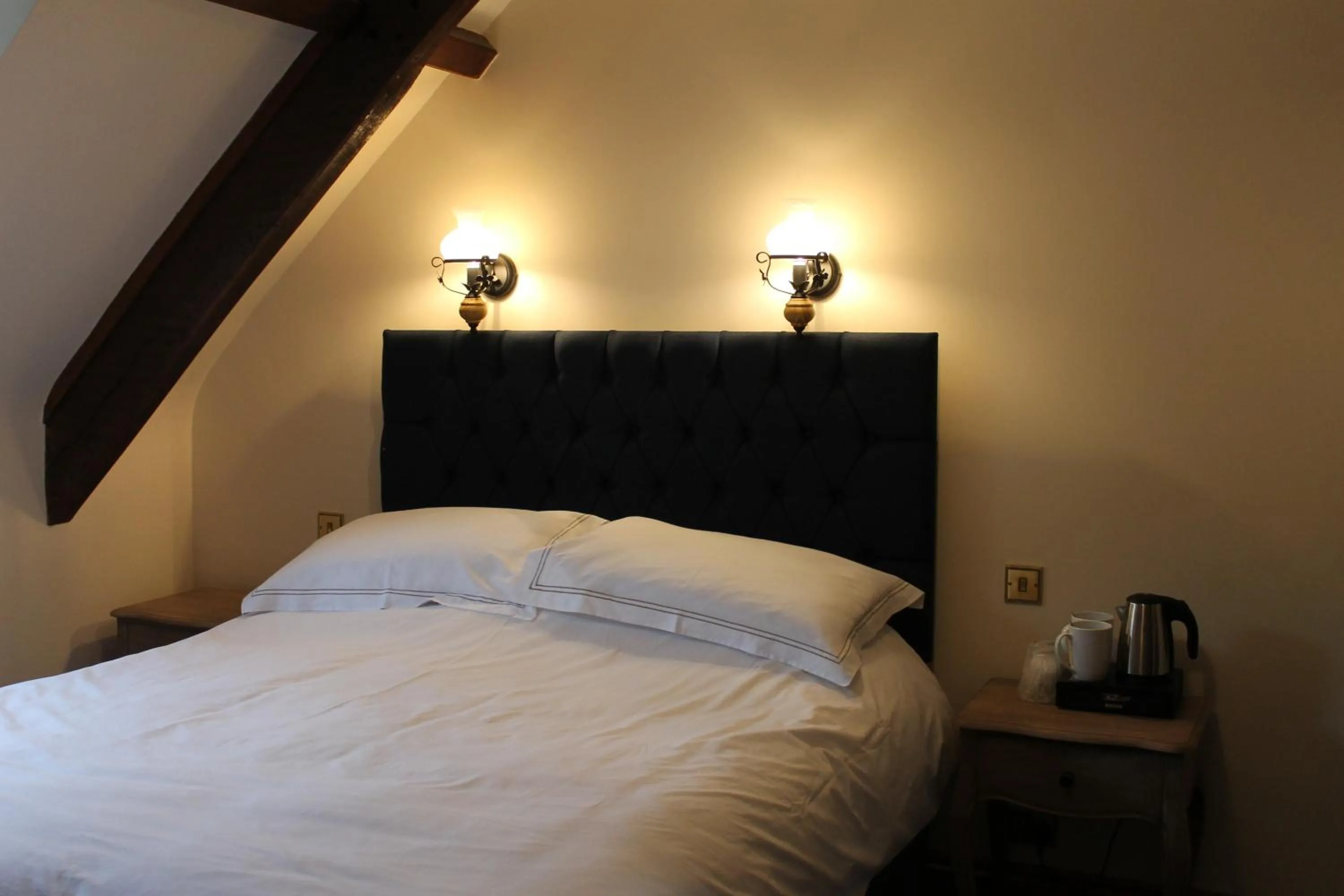 Bed in The Eagle House Hotel