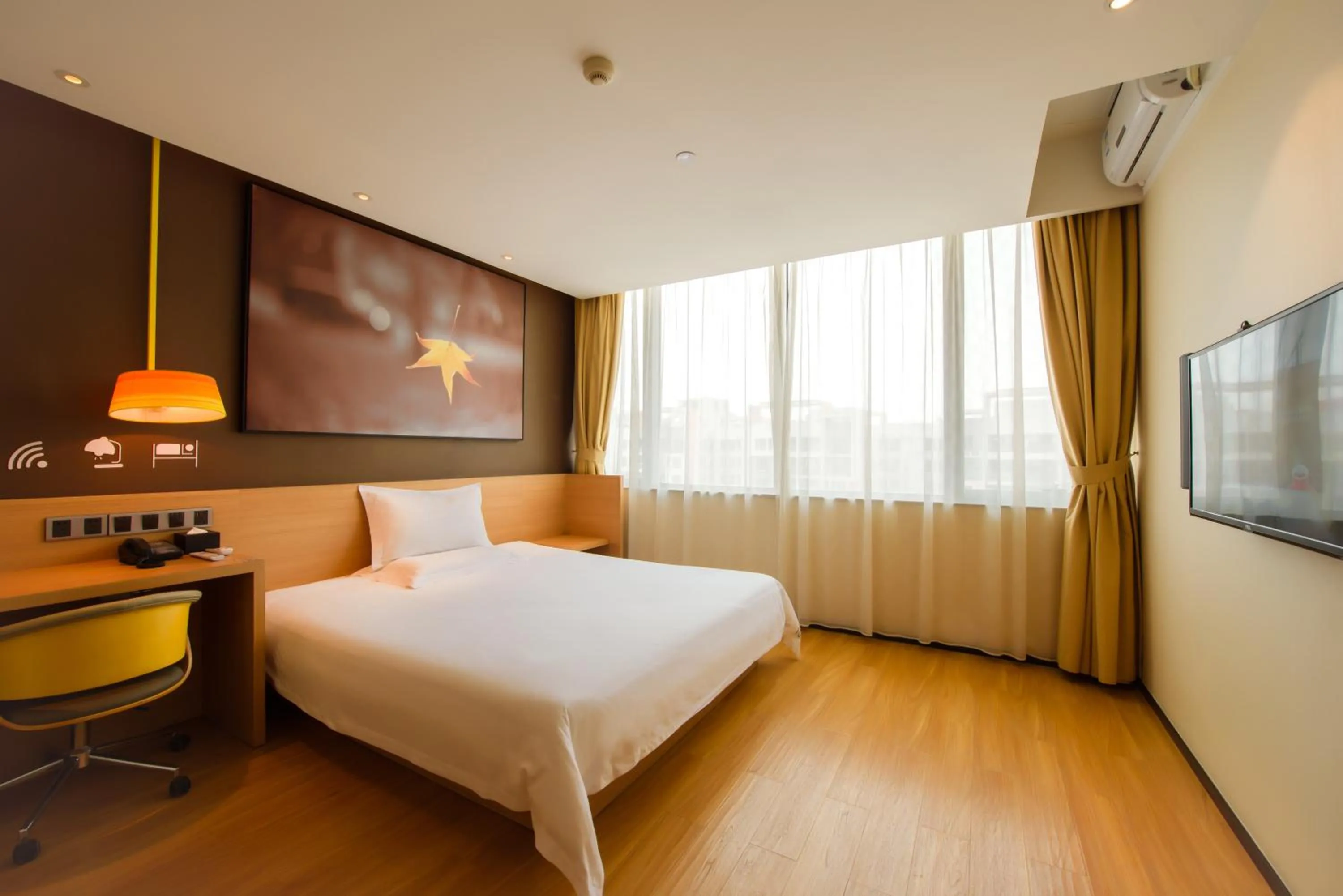 Bed in IU Hotel Ruoyang Yiyang Wenhua Road