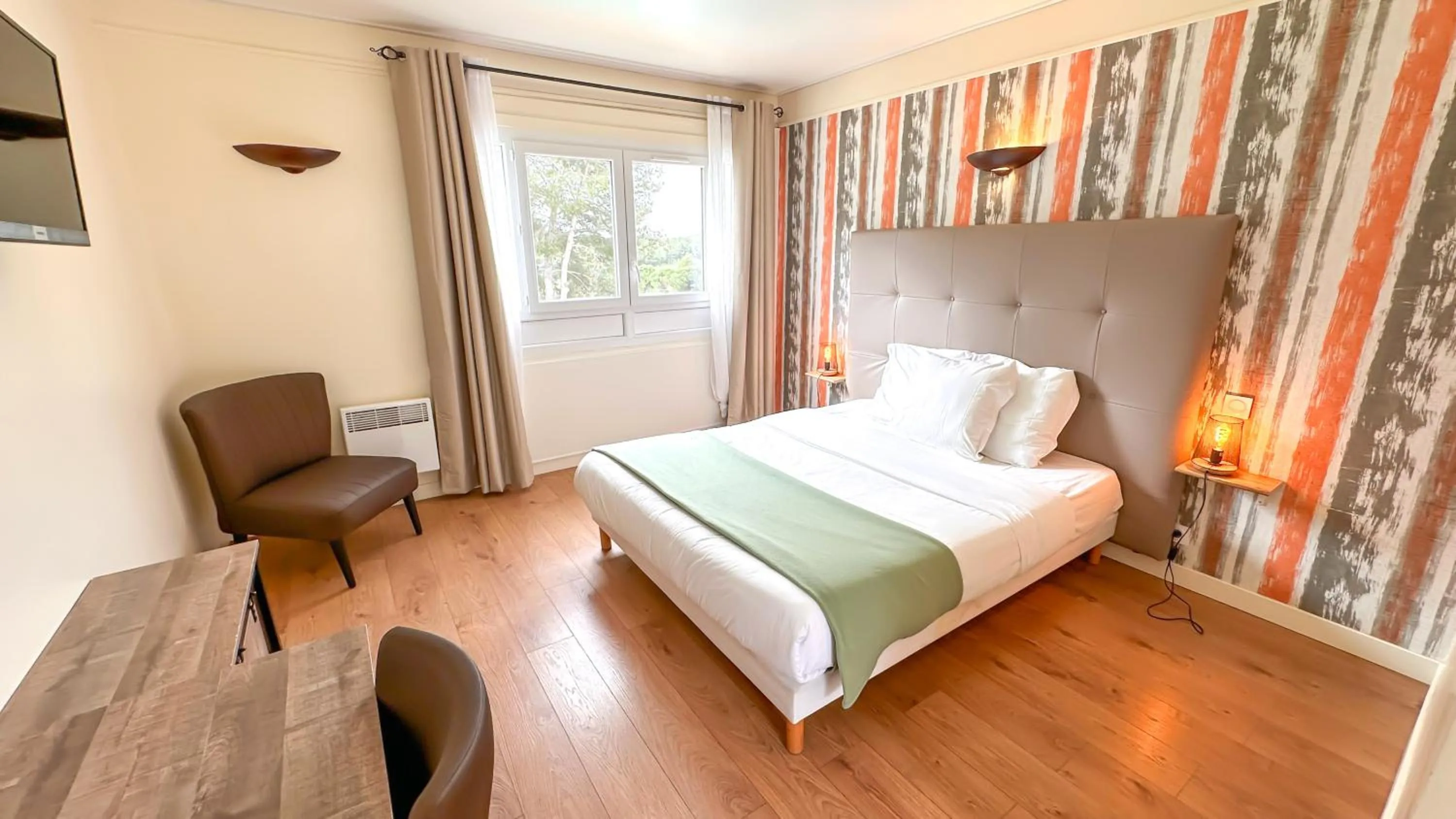 Bed in Hotel Les Rocailles