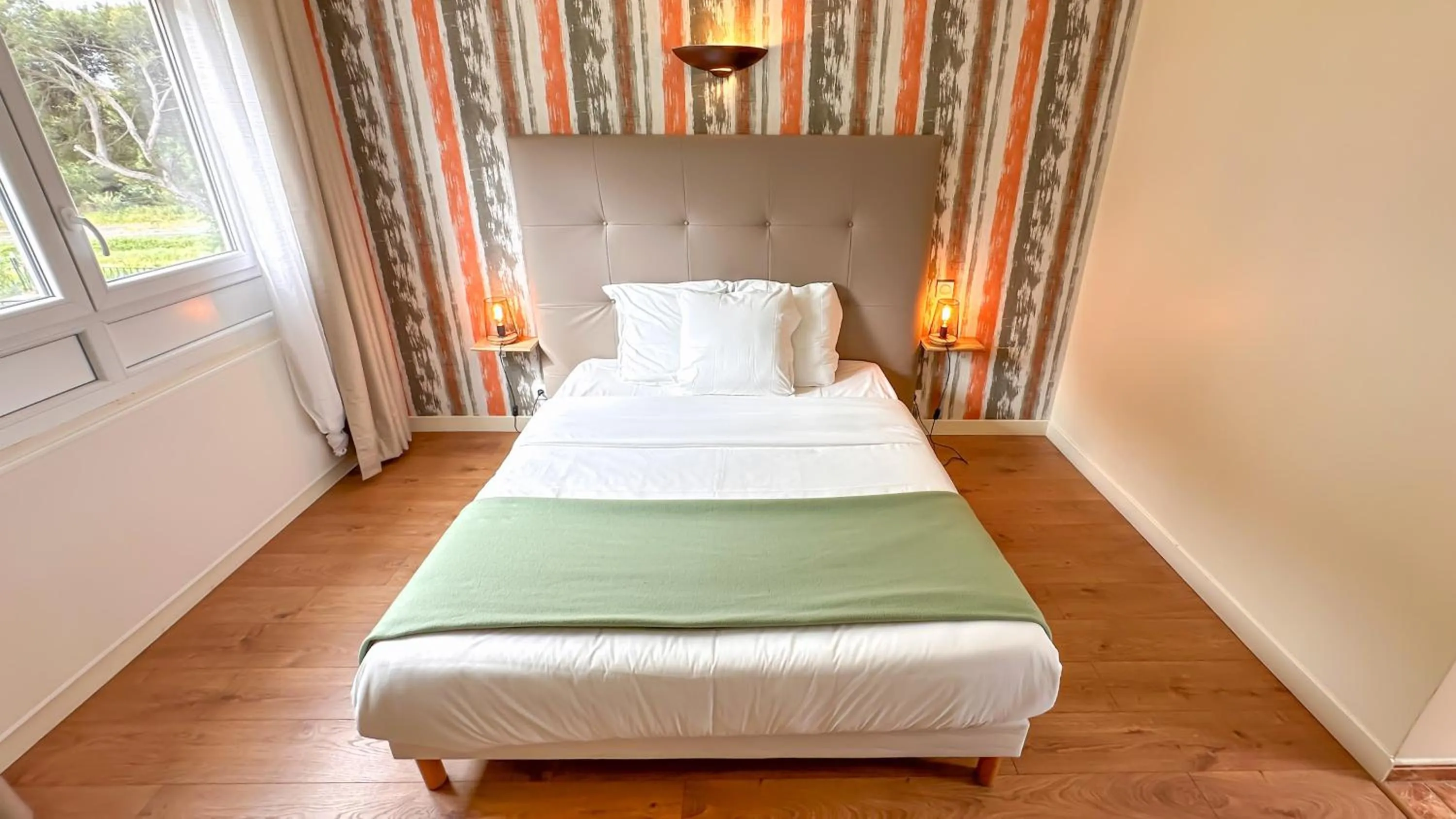 Bed in Hotel Les Rocailles