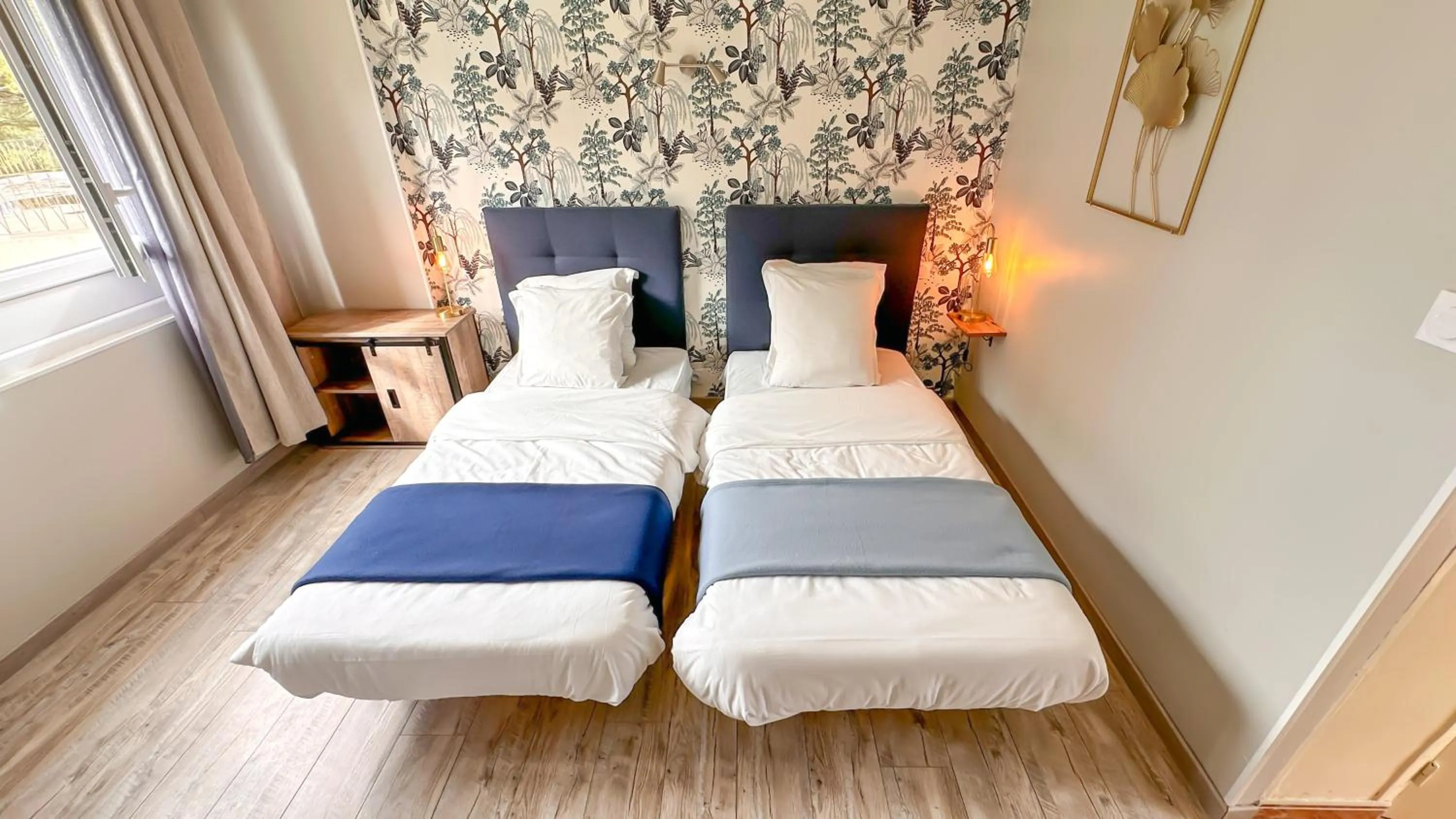 Bed in Hotel Les Rocailles