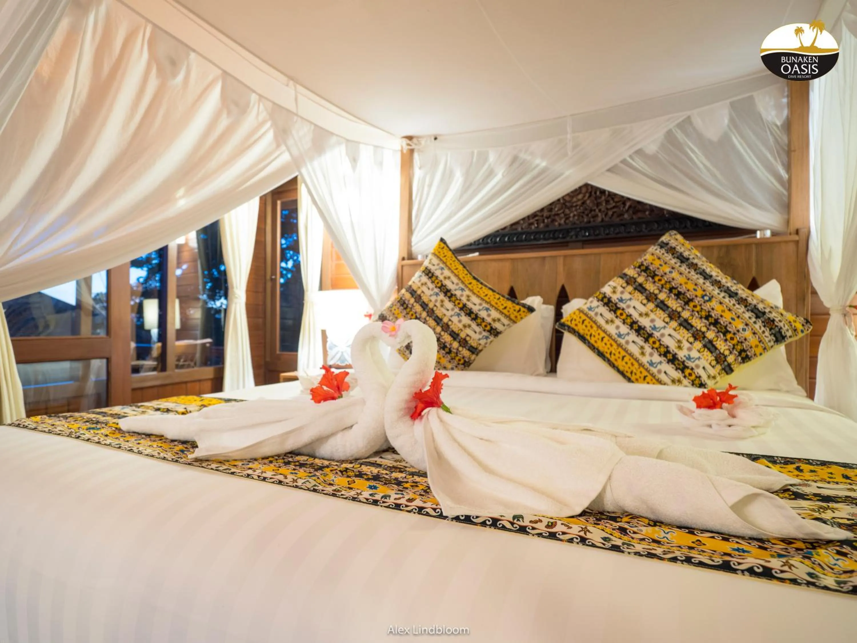 Bed in Bunaken Oasis Dive Resort and Spa