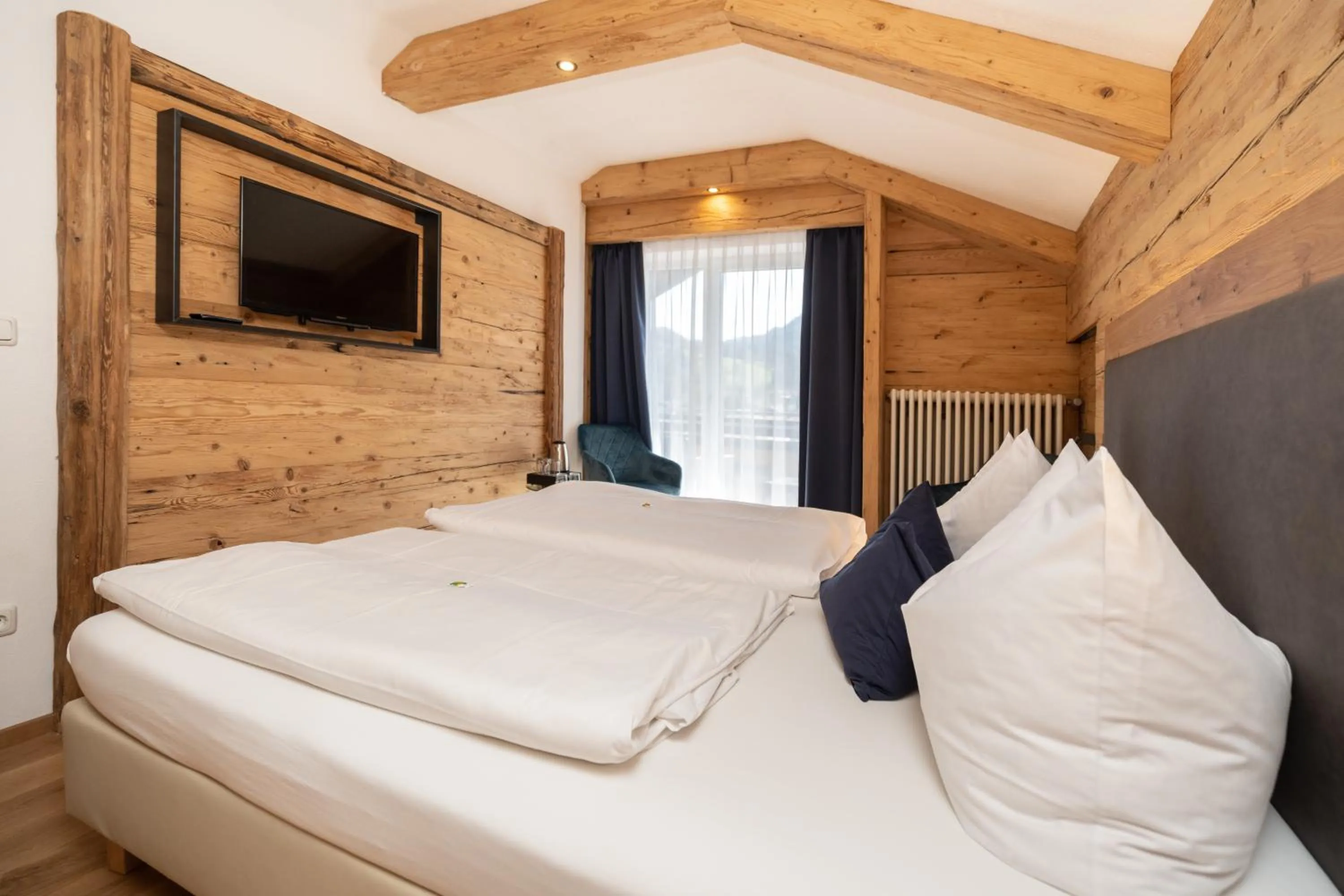 Photo of the whole room, Bed in Hotel Sonnenspitz ***