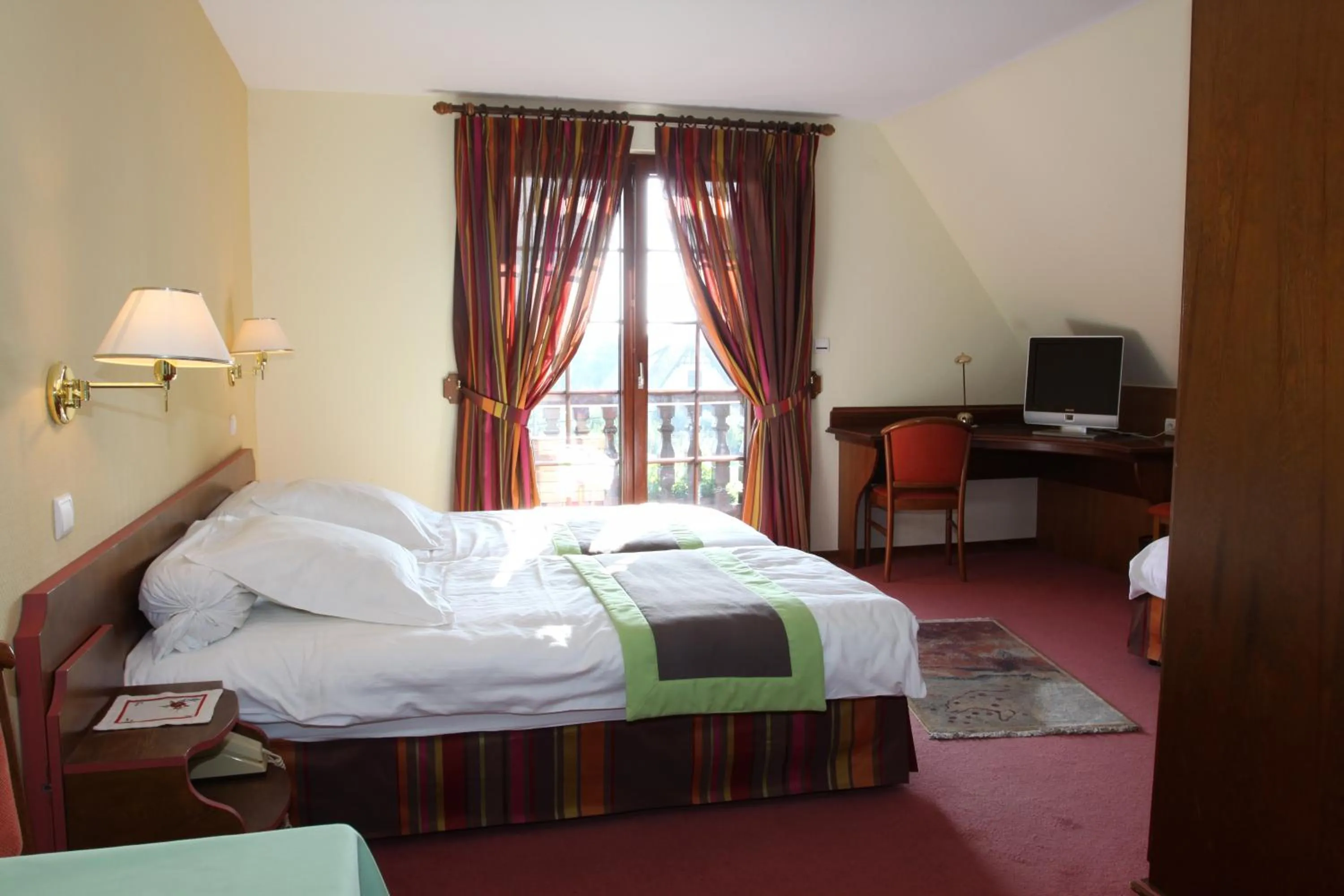 Decorative detail, Bed in Logis Hotel Restaurant A L'Etoile