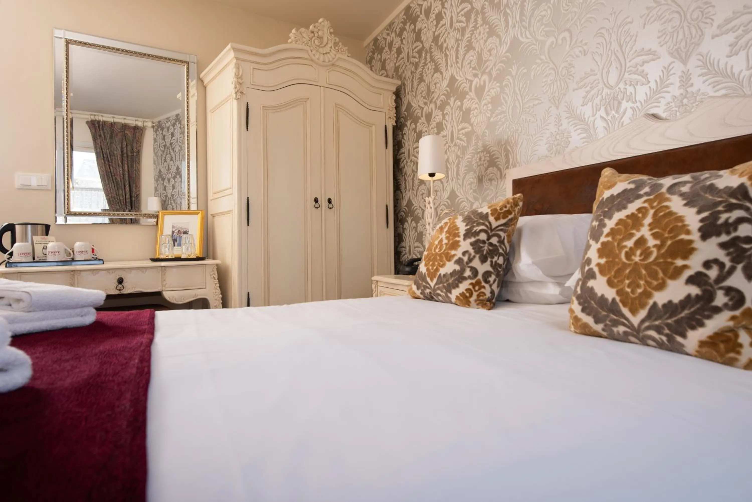 Bed in Logis Hotel De France