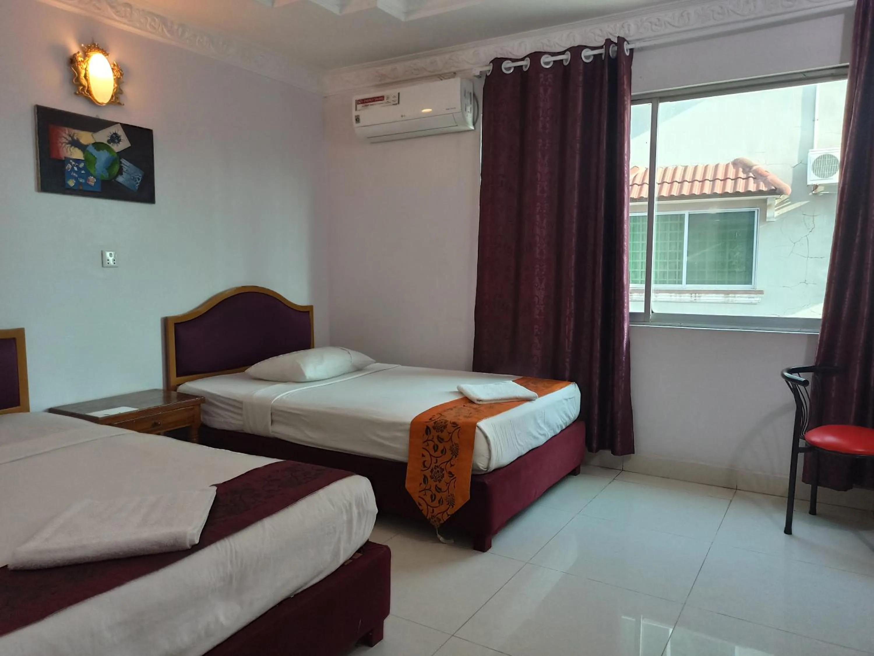 Bed in PAMA Hotel