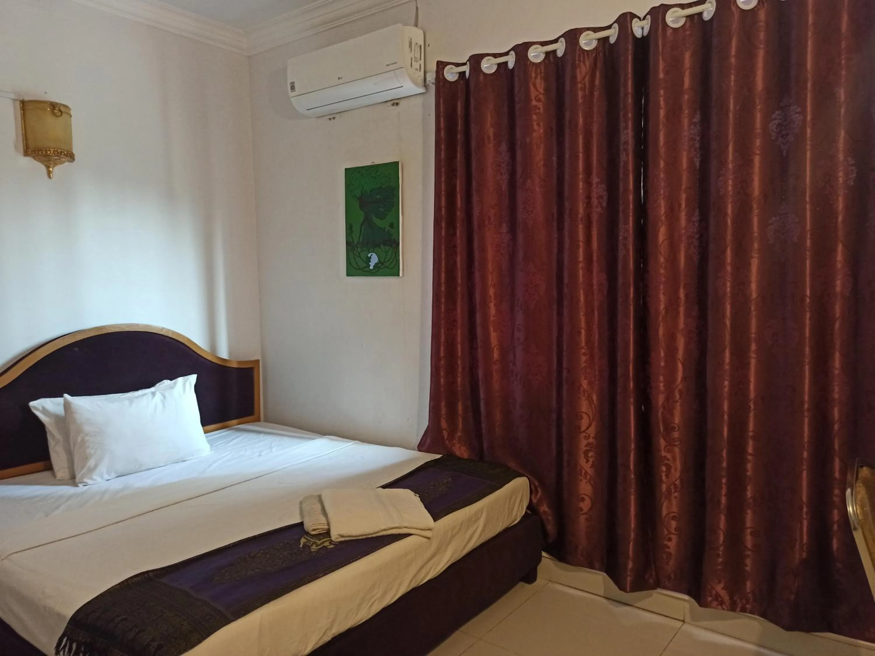 Bed in PAMA Hotel