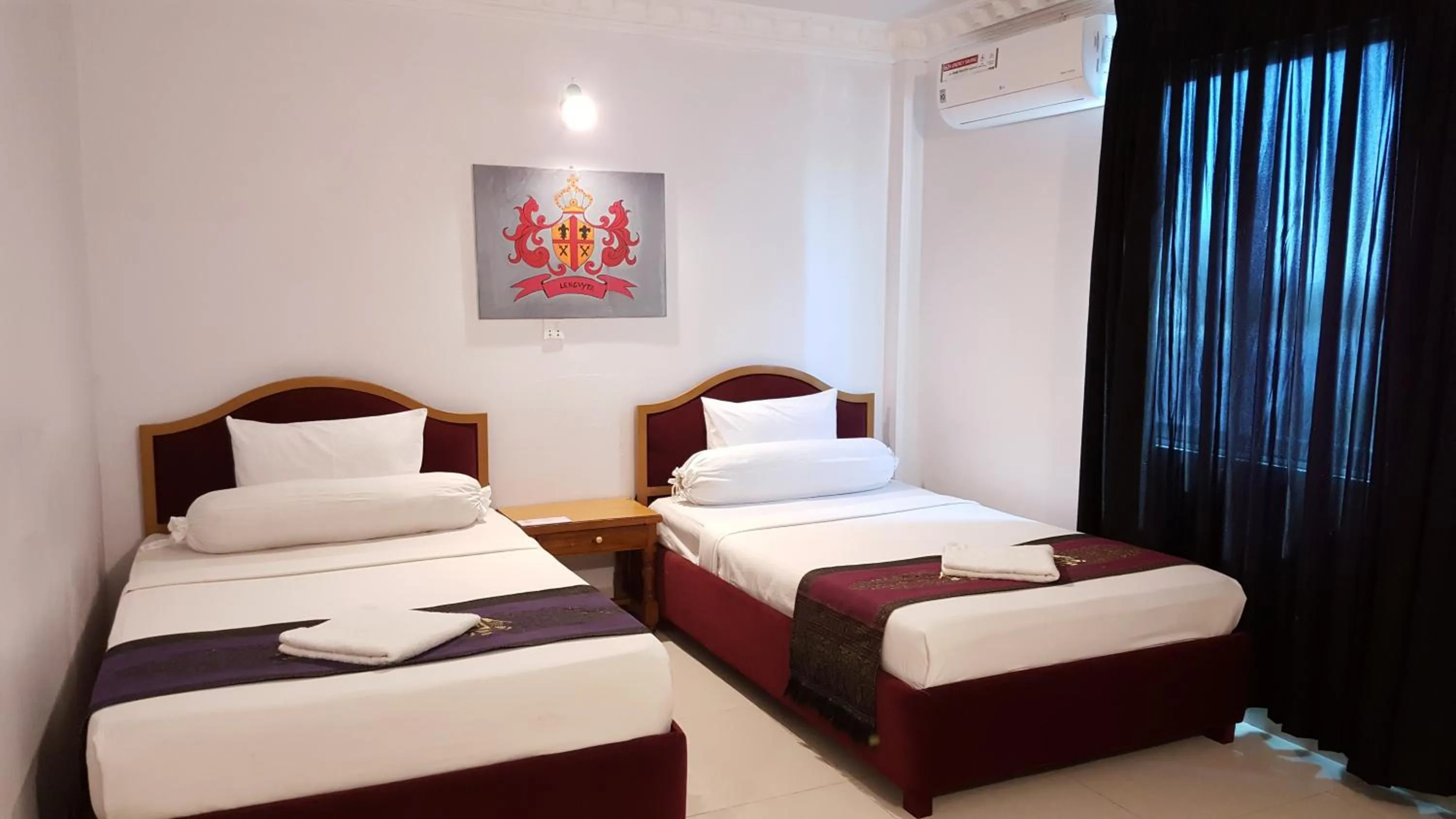 Bed in PAMA Hotel