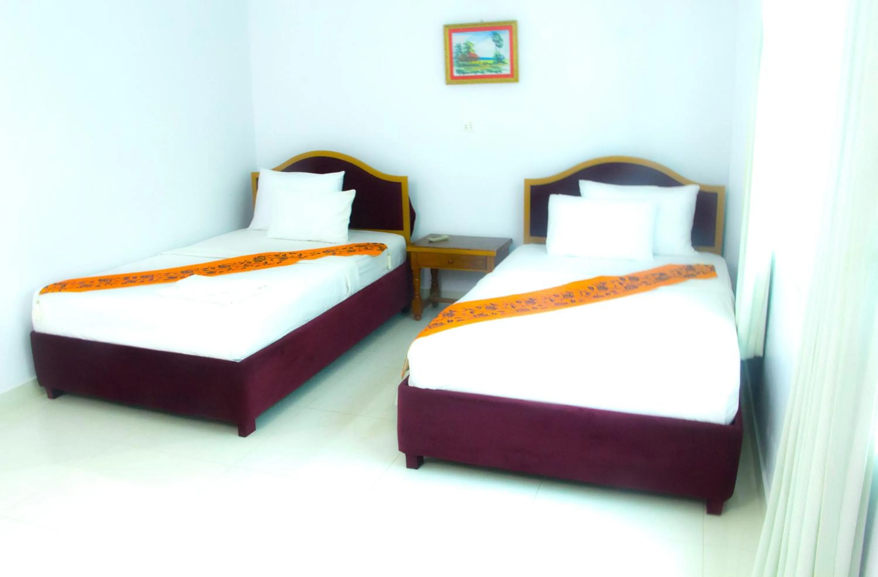 Bed in PAMA Hotel