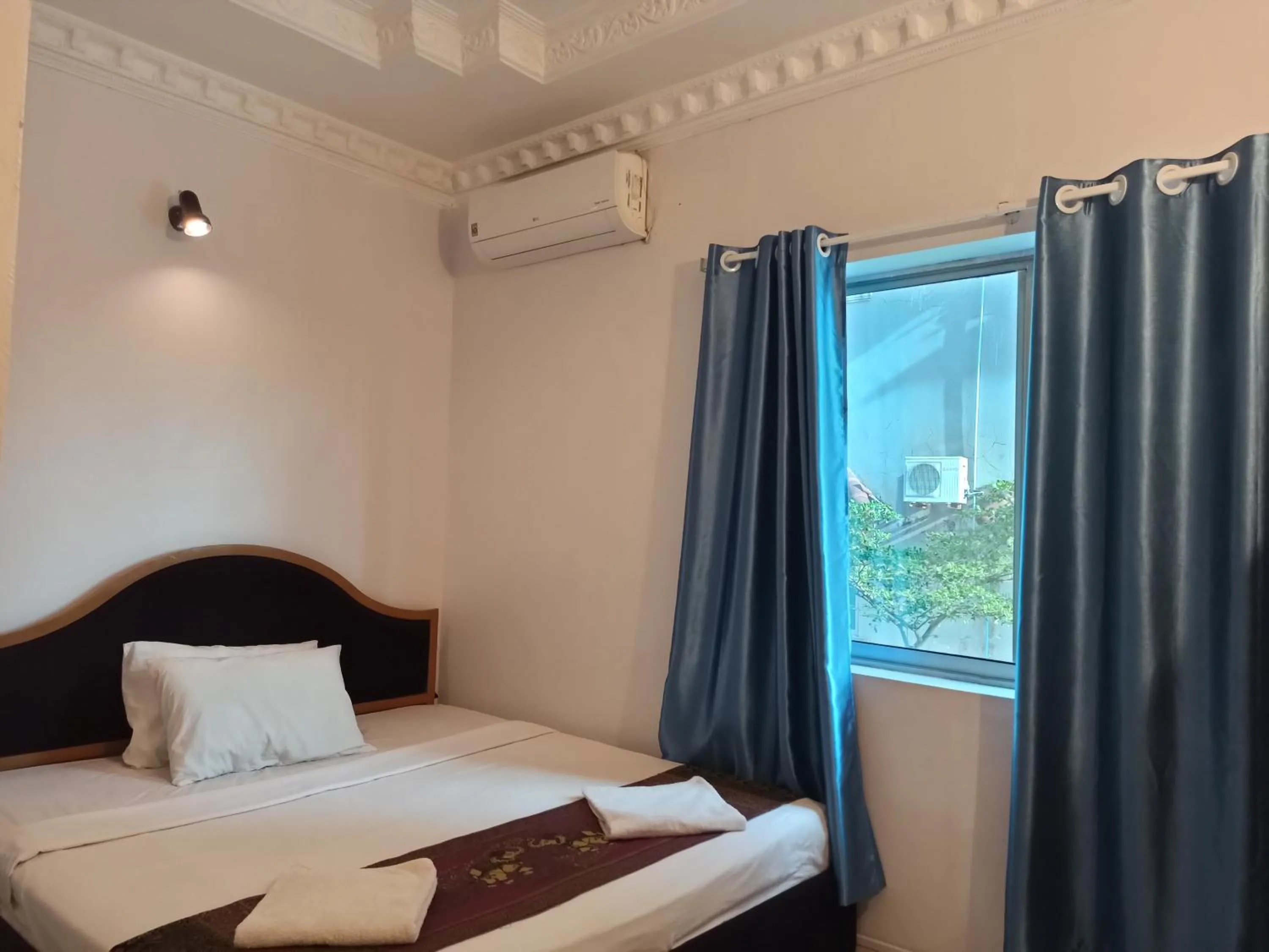 Bed in PAMA Hotel