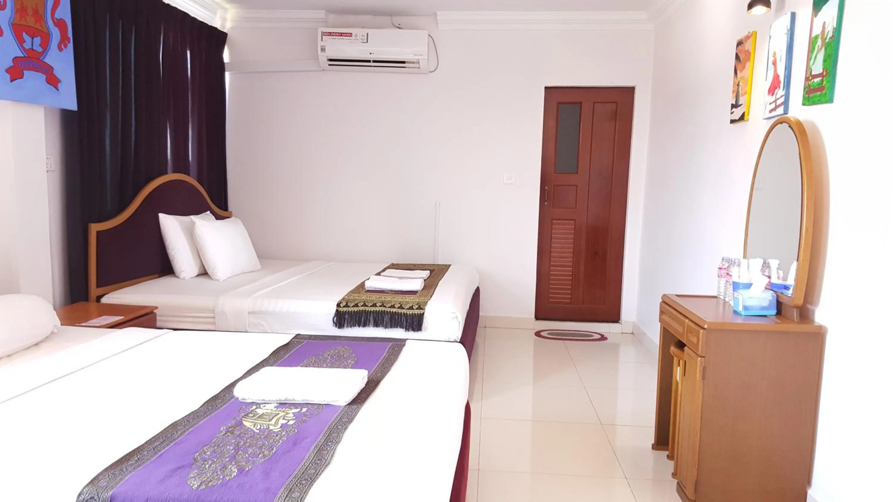 Bed in PAMA Hotel