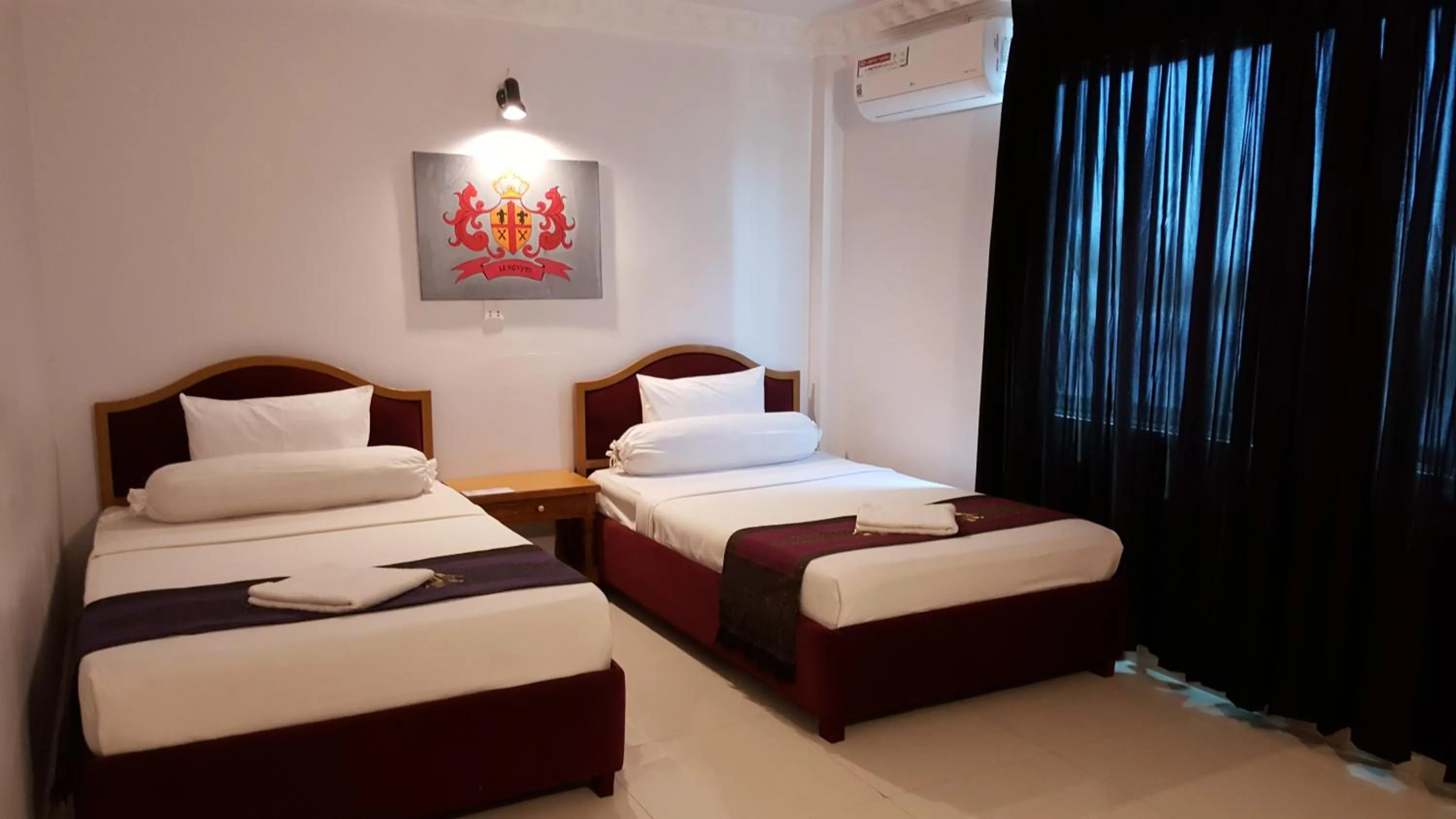Bed in PAMA Hotel