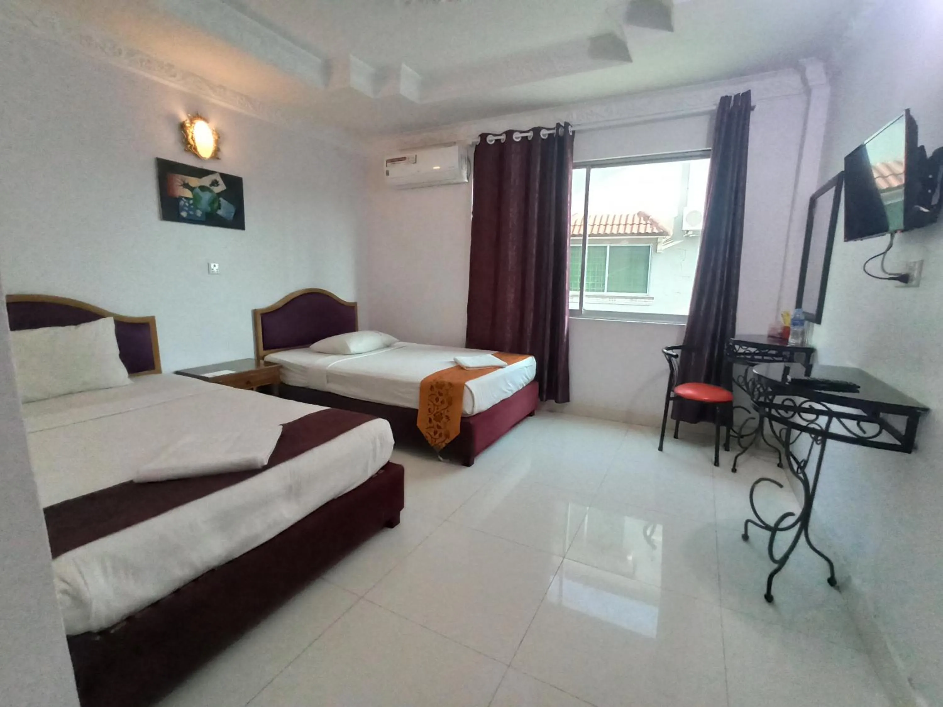 Bed in PAMA Hotel