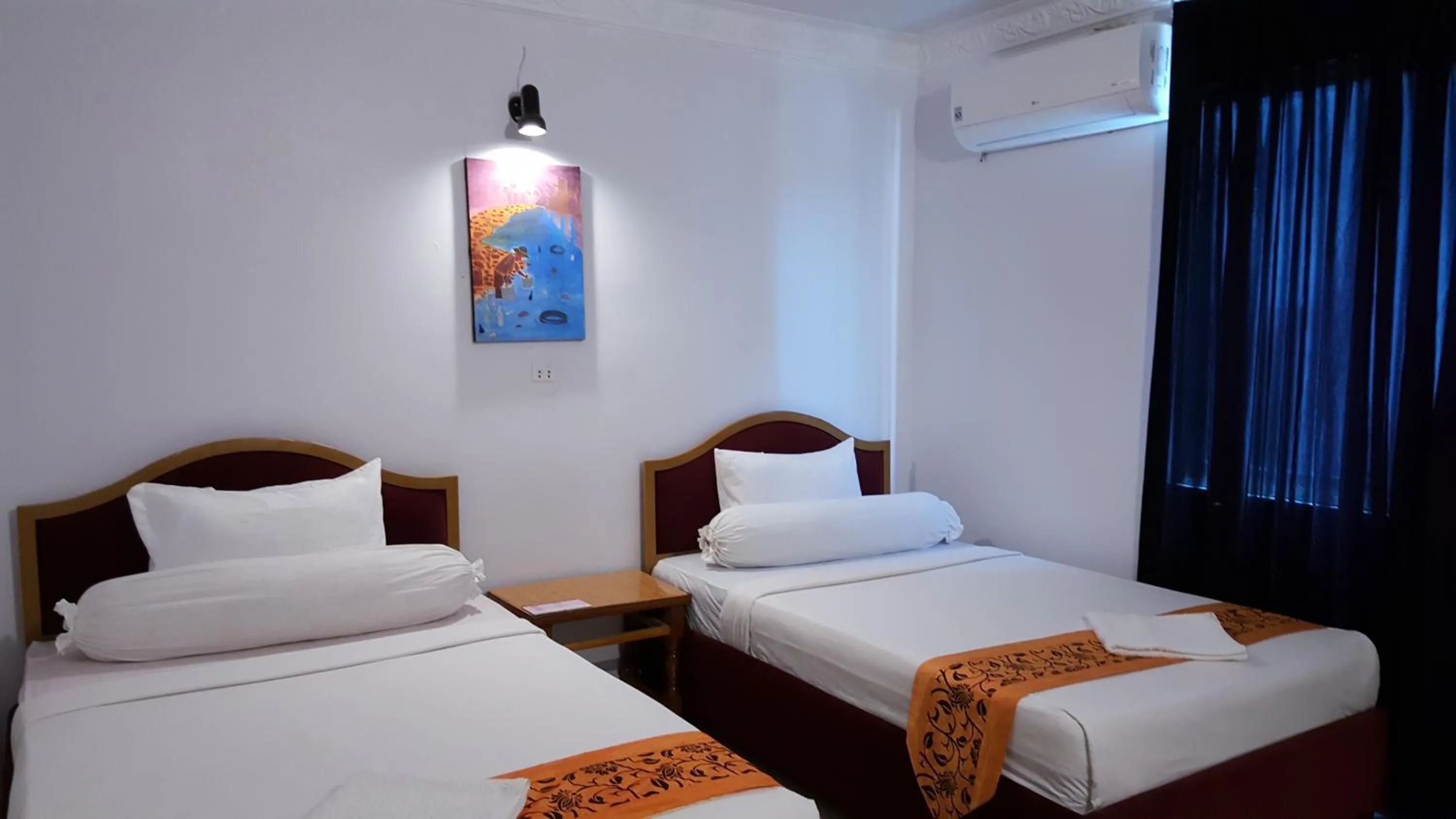 Bed in PAMA Hotel