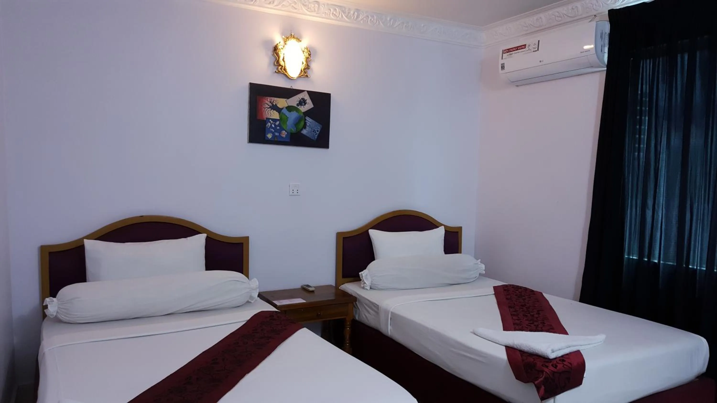 Bed in PAMA Hotel