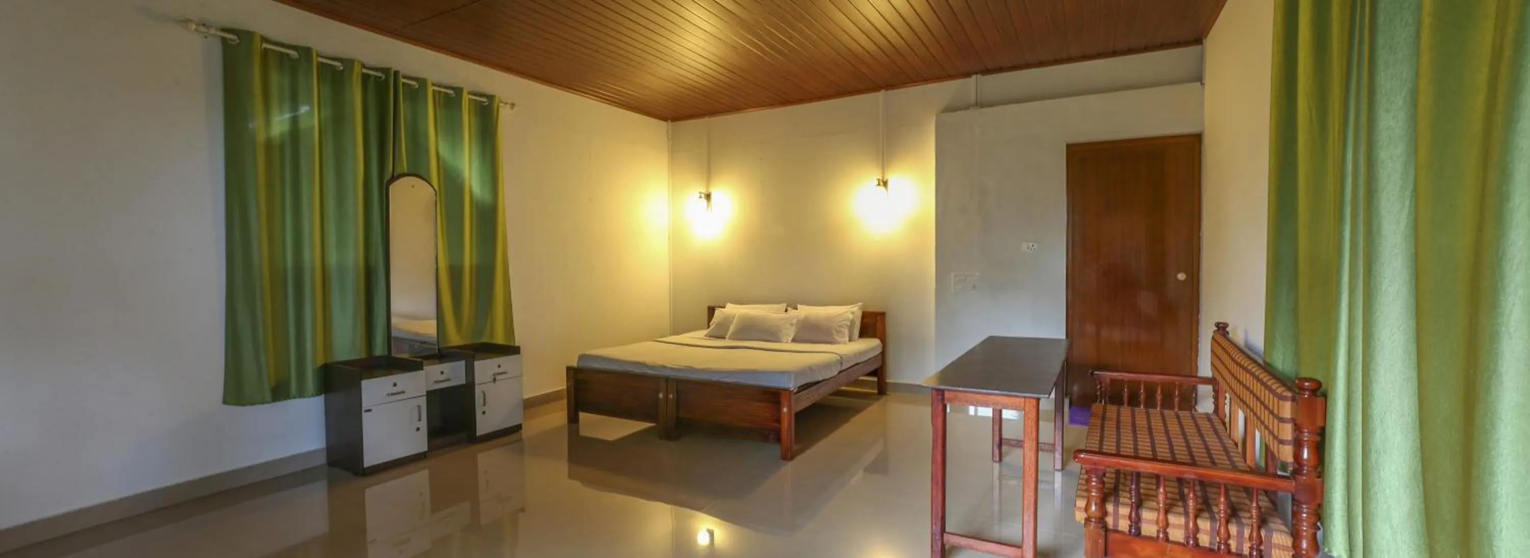 Bed in Rock Haven Wayanad