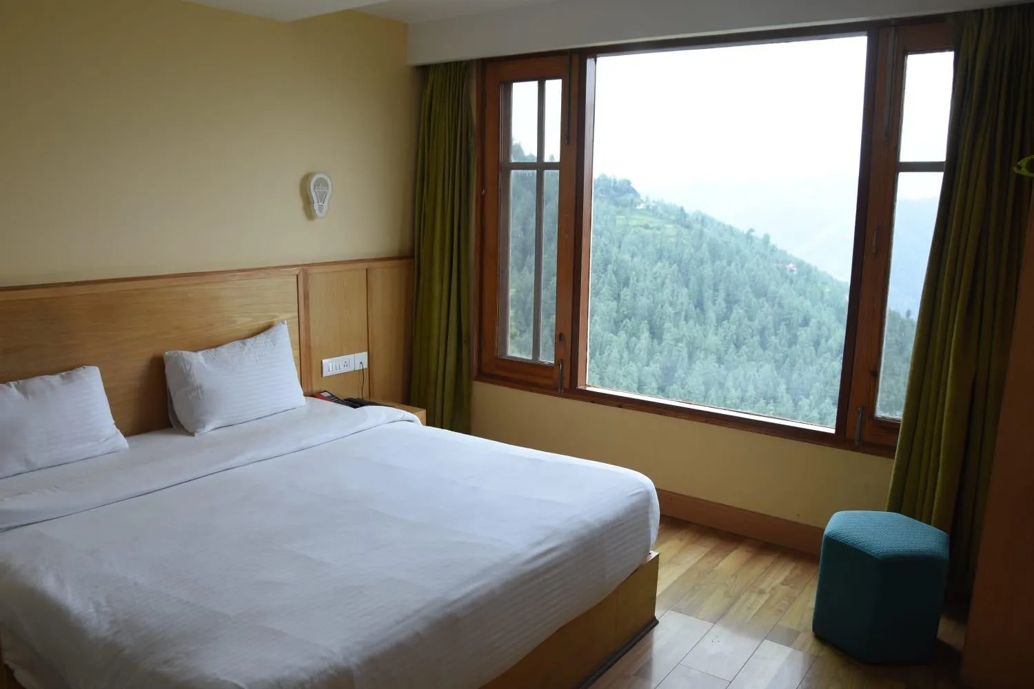 Bed in The Byke Nature Vilas Pure Veg