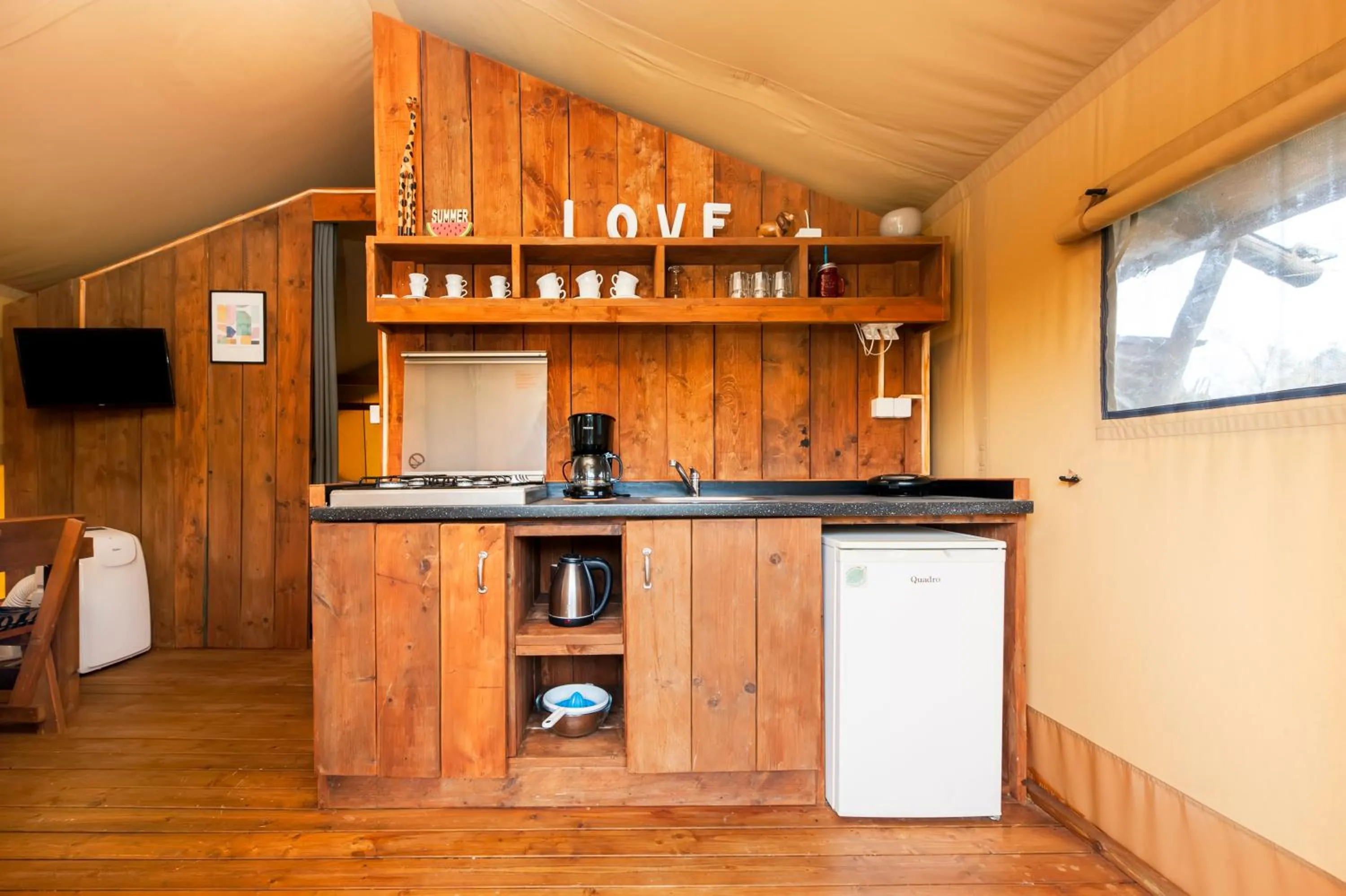 Communal kitchen in Glamping and Mobile Homes Lavanda - Holiday Centre Bi VIllage