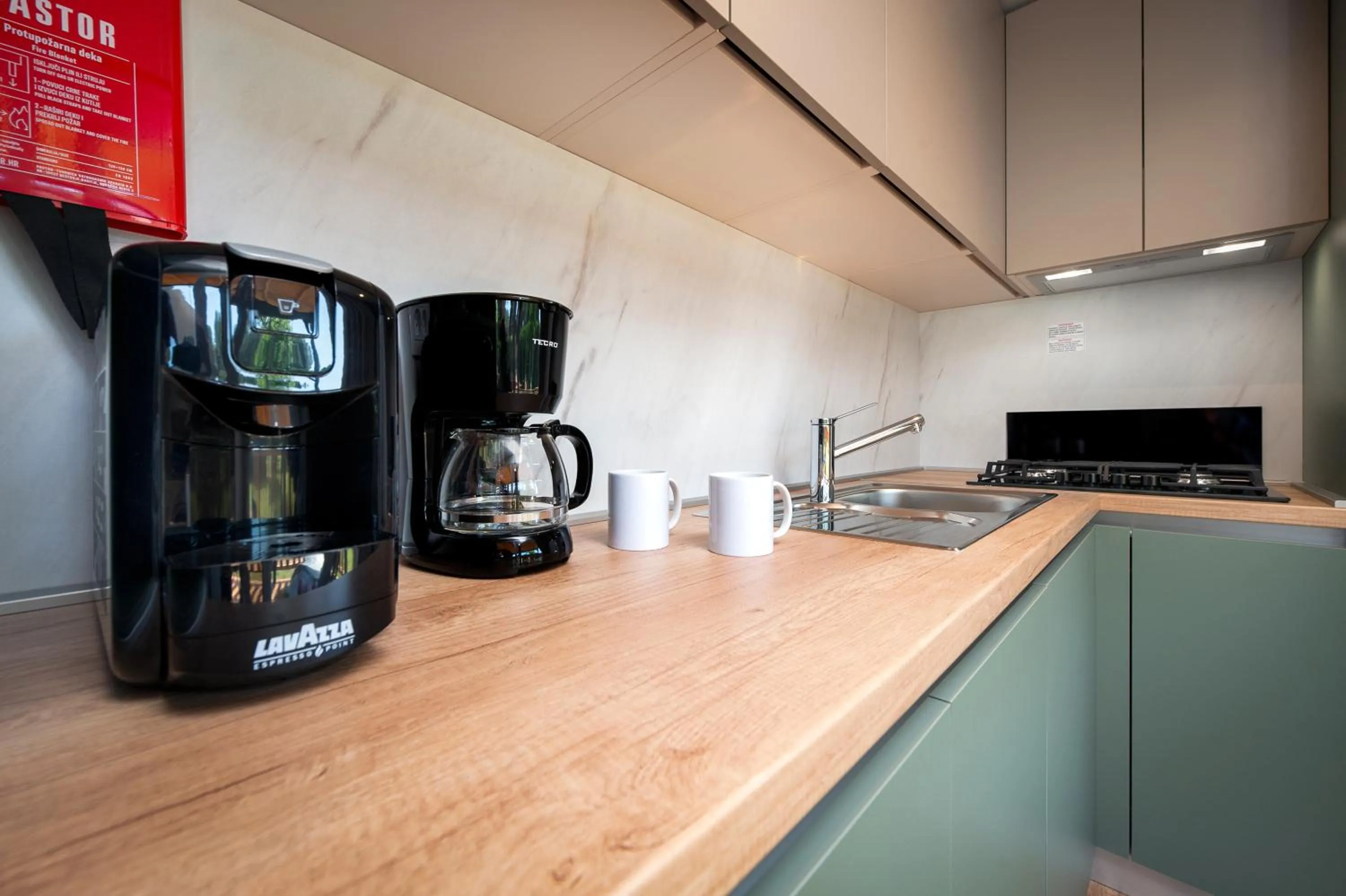 Kitchen or kitchenette in Glamping and Mobile Homes Lavanda - Holiday Centre Bi VIllage