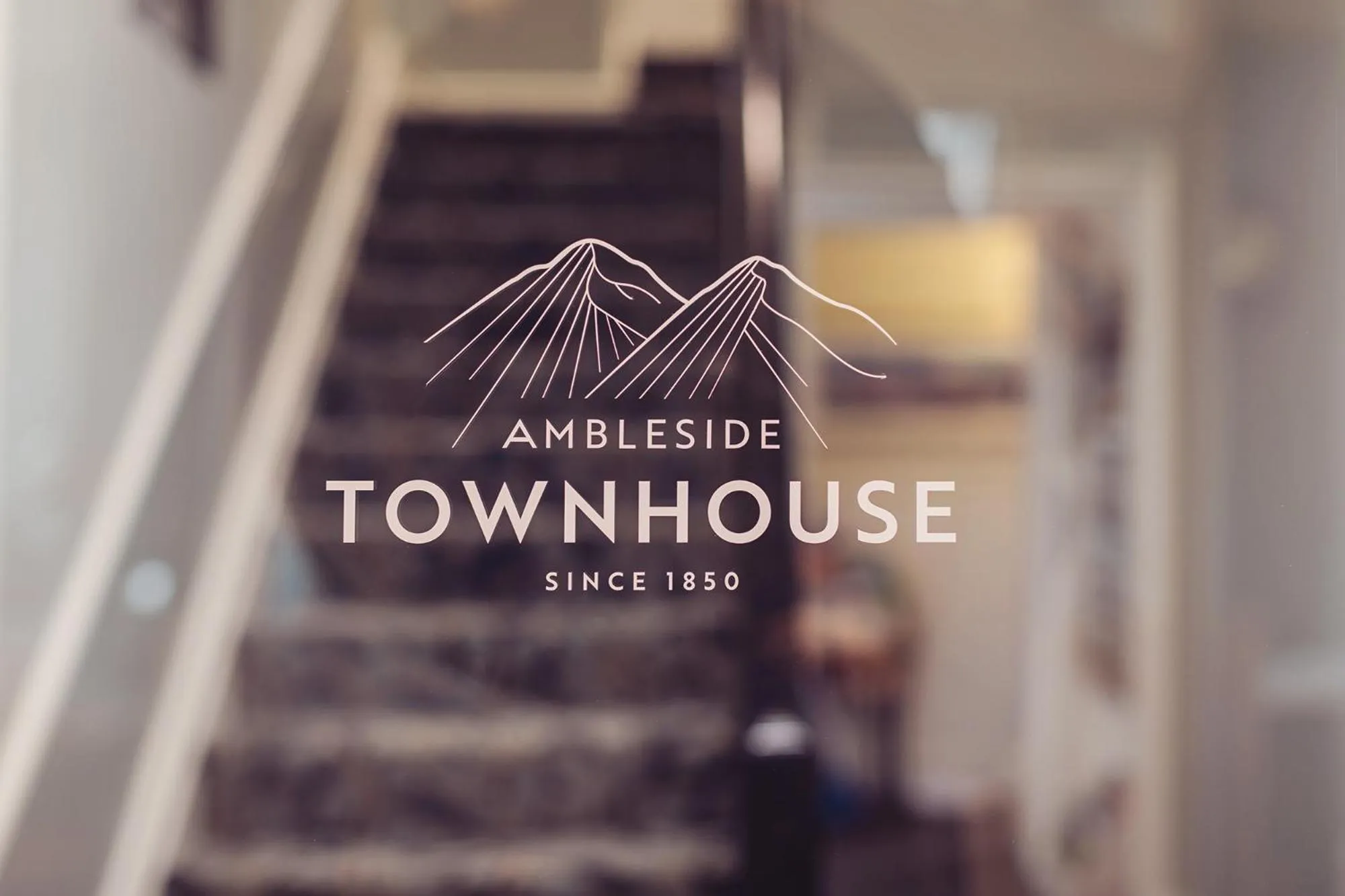 Property logo or sign in Ambleside Townhouse