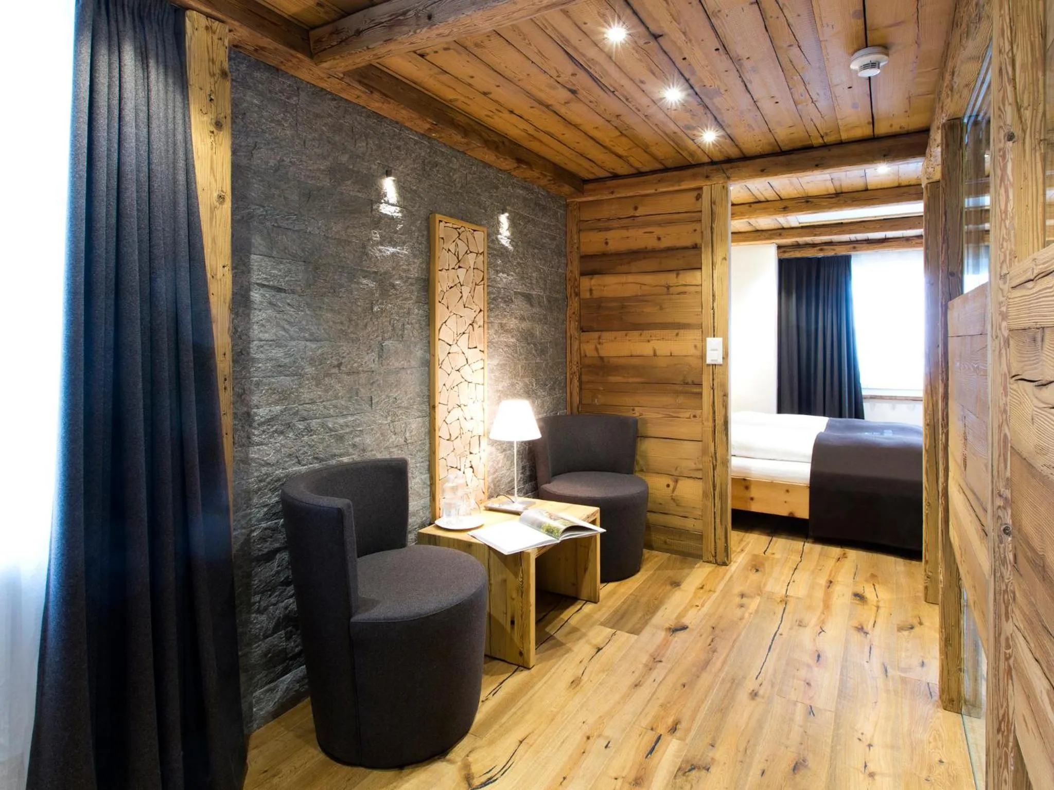 Photo of the whole room, Bed in Hotel Crusch Alba Zernez