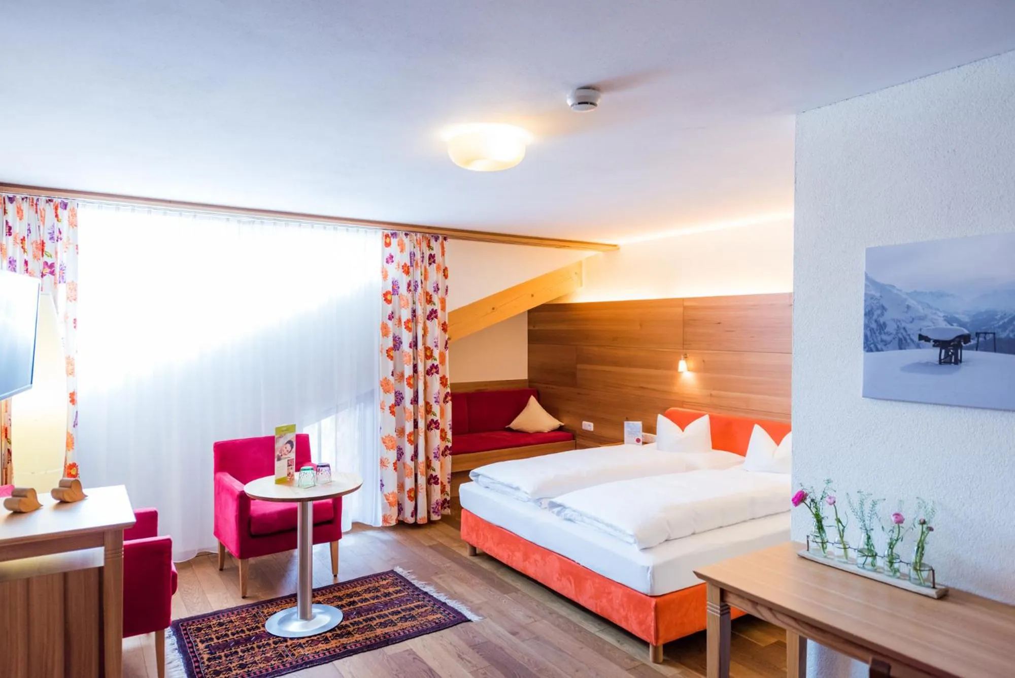 Living room, Bed in Hotel Walserberg