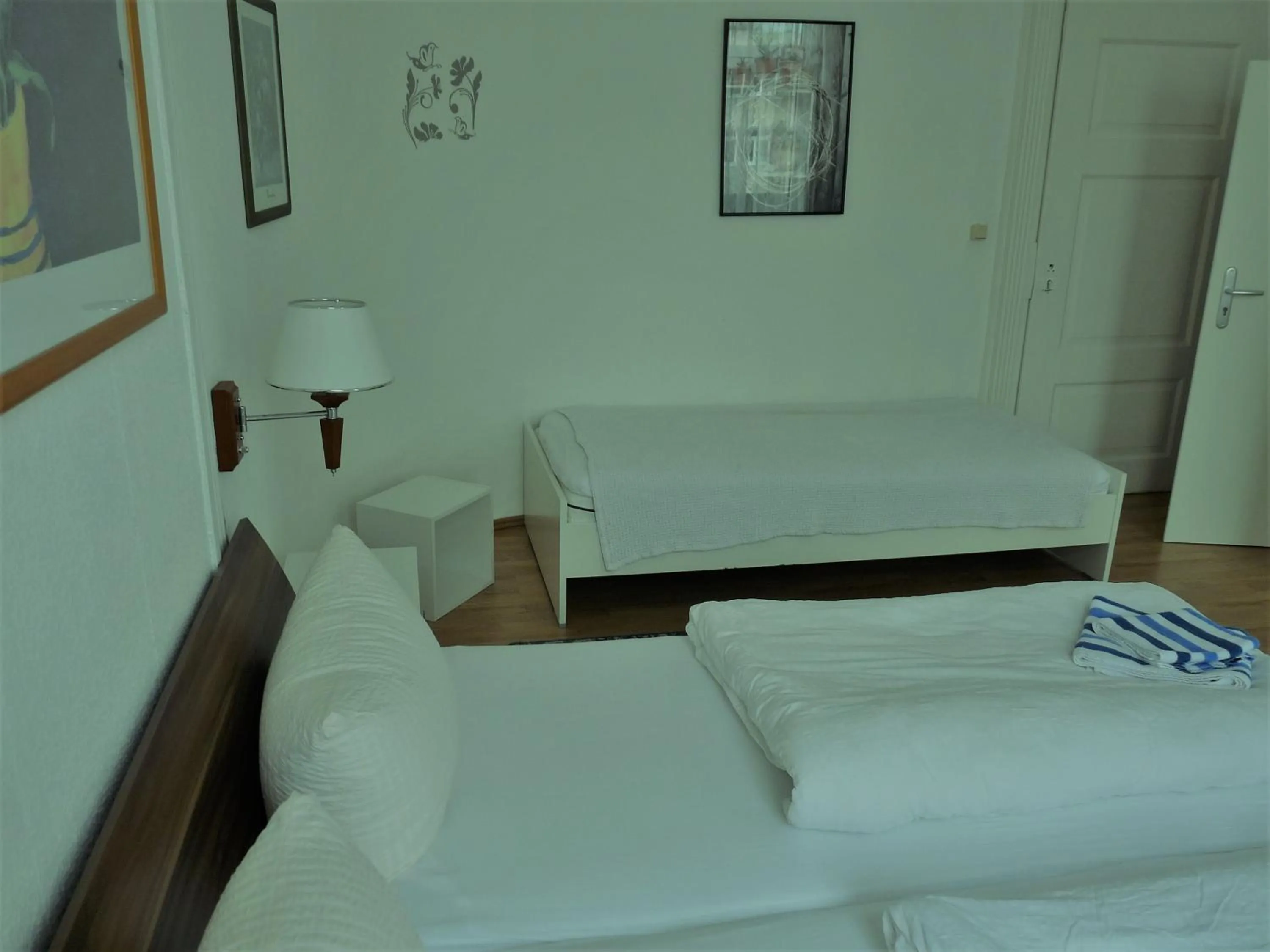 Bed in MARKT EINS Gästezimmer