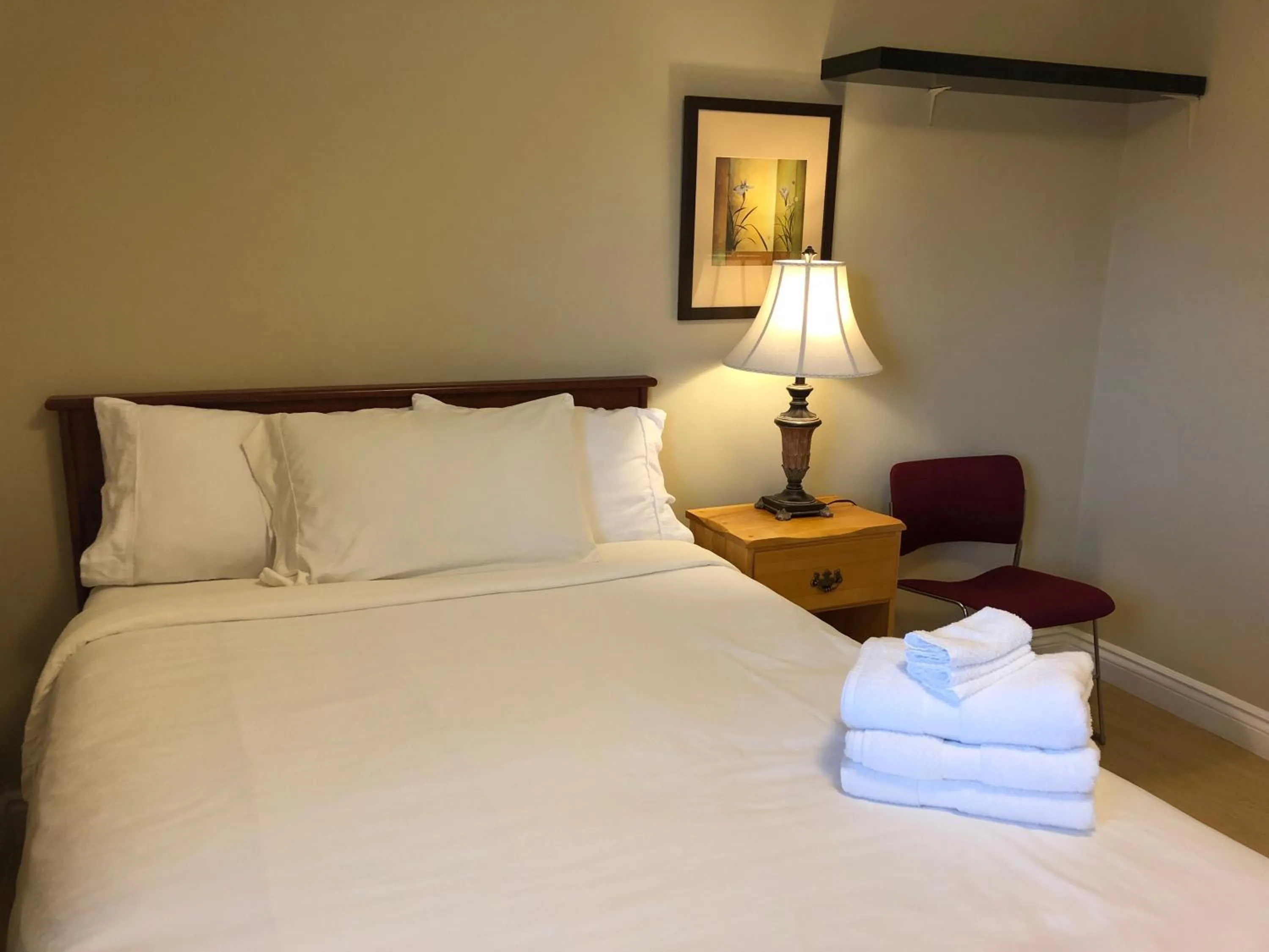 Bed in Cozy Bedrooms Guest House