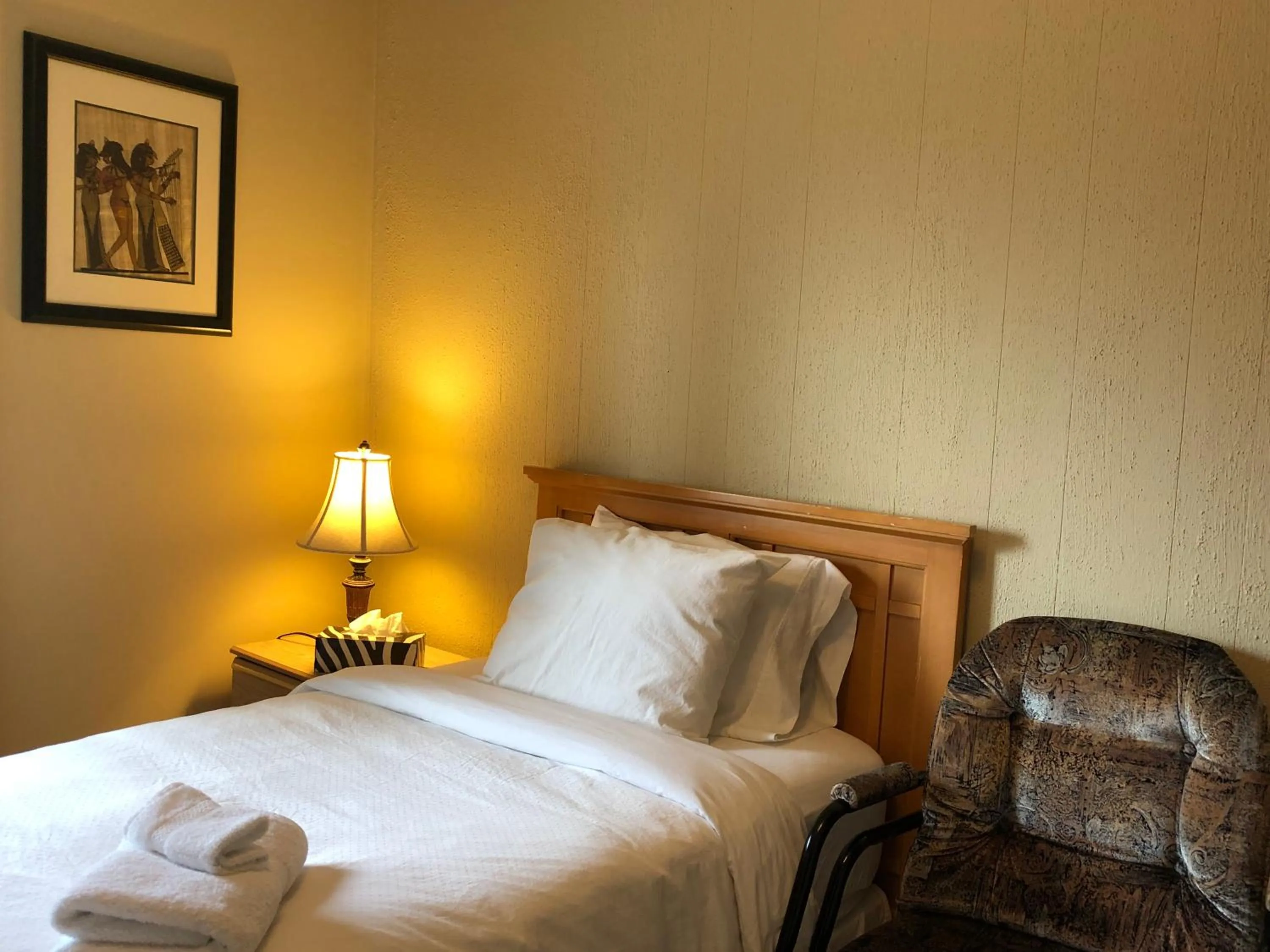 Bed in Cozy Bedrooms Guest House