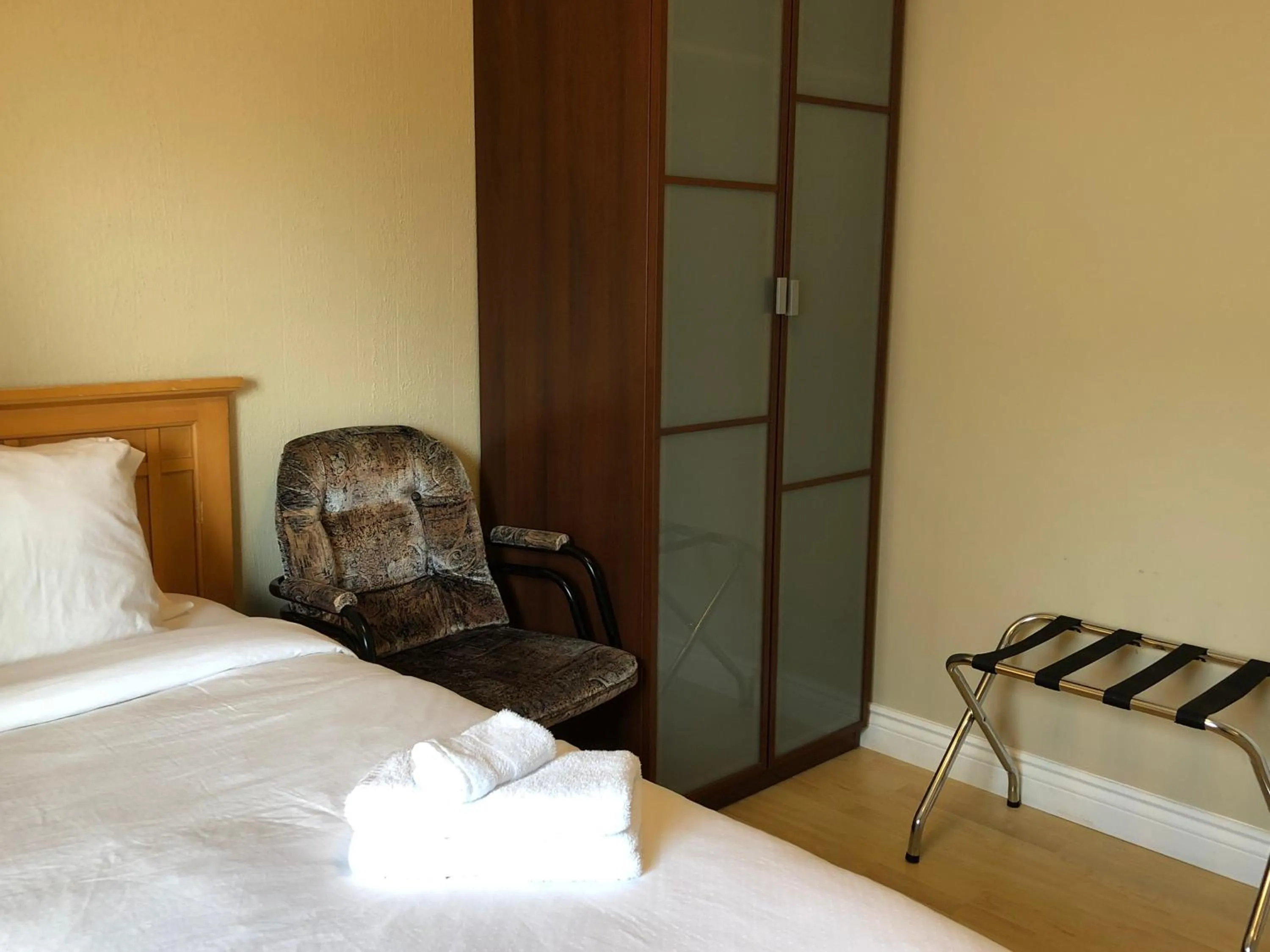 Bed in Cozy Bedrooms Guest House