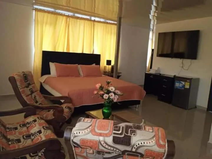 Bed in Hotel Cafe Plaza