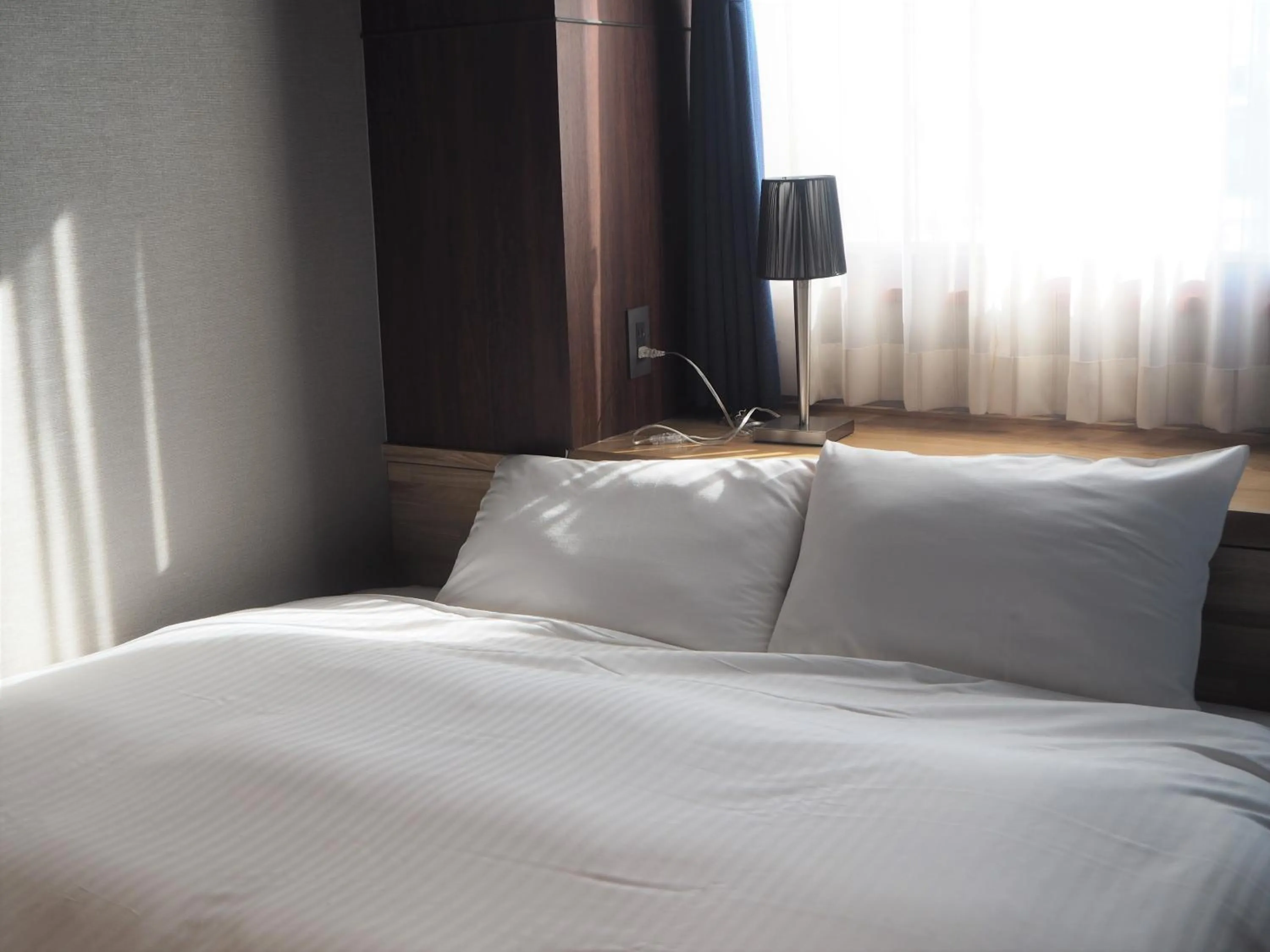 Bed in Kojohama Onsen Hotel