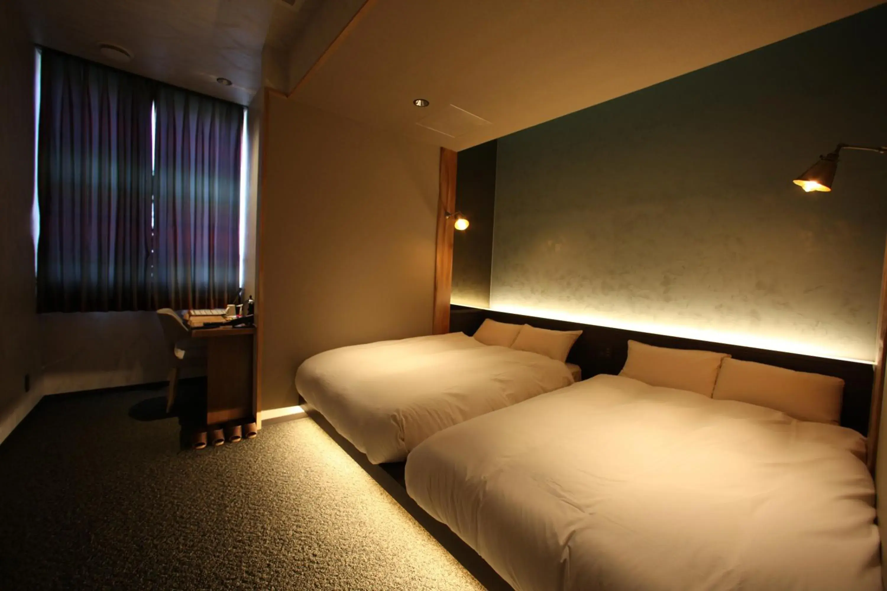 Bed in Kojohama Onsen Hotel Bed in Kojohama Onsen Hotel