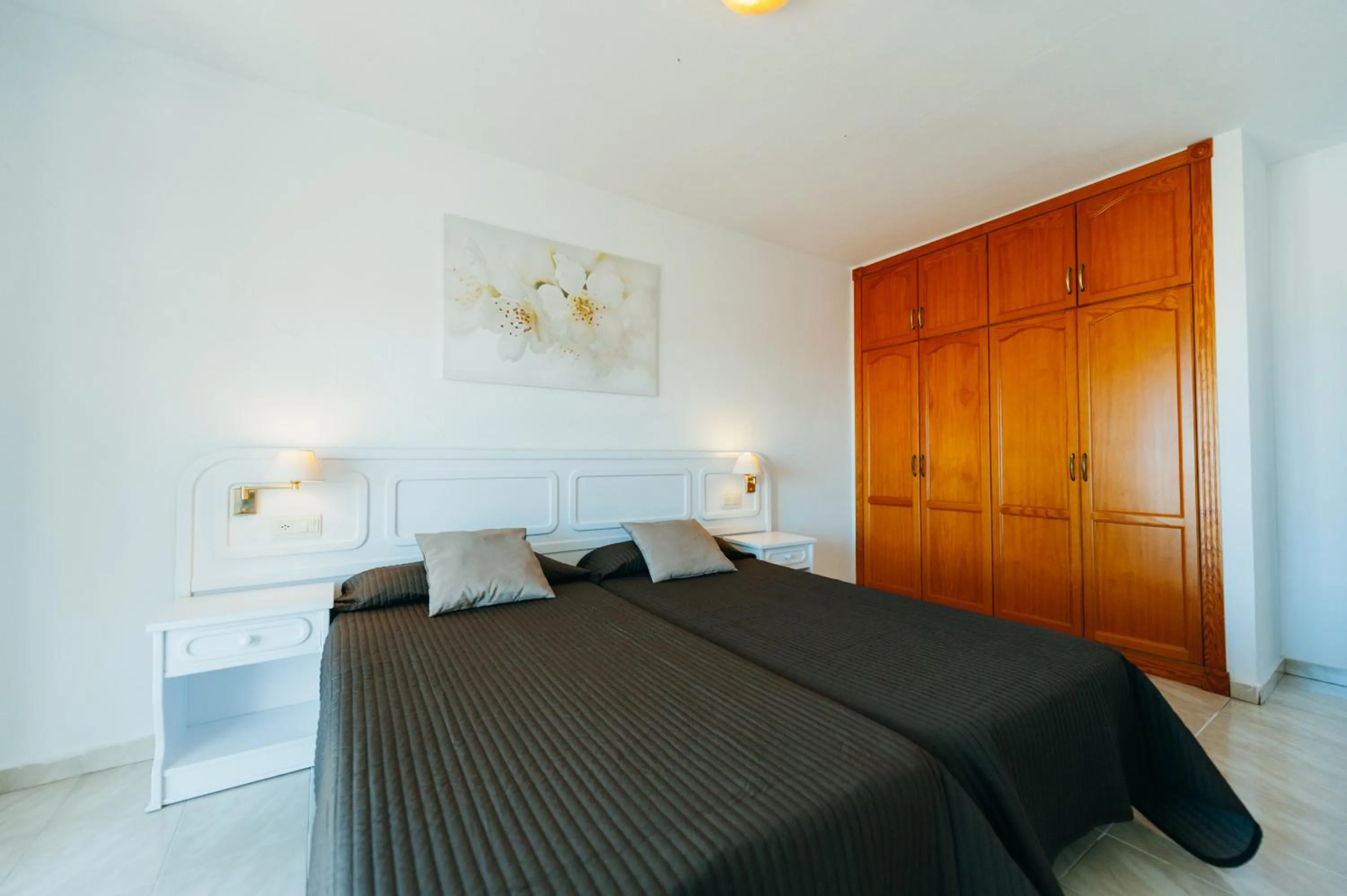 Bed in Aparthotel Neptuno Costadeje