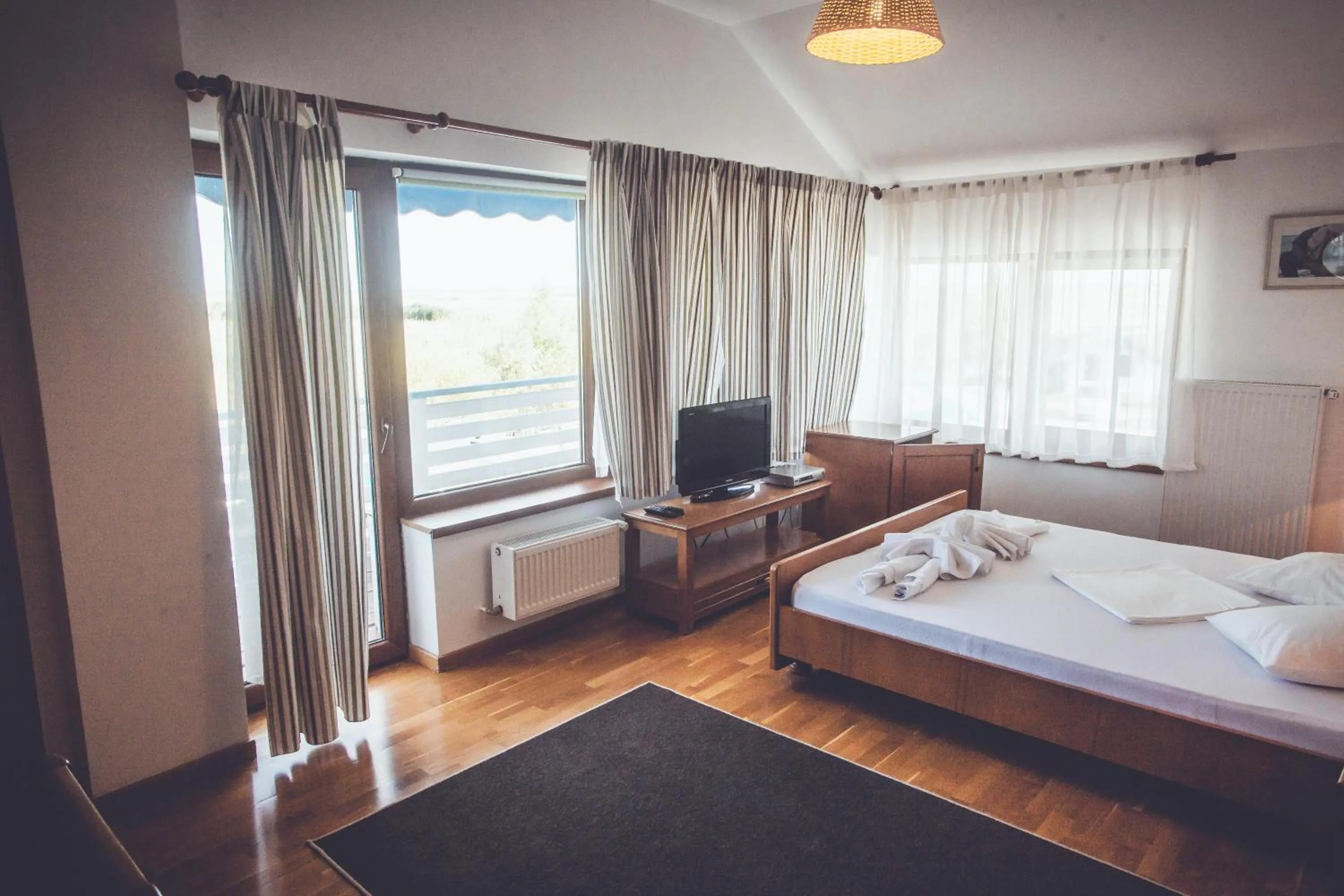 Photo of the whole room, Bed in Casa Pescarilor